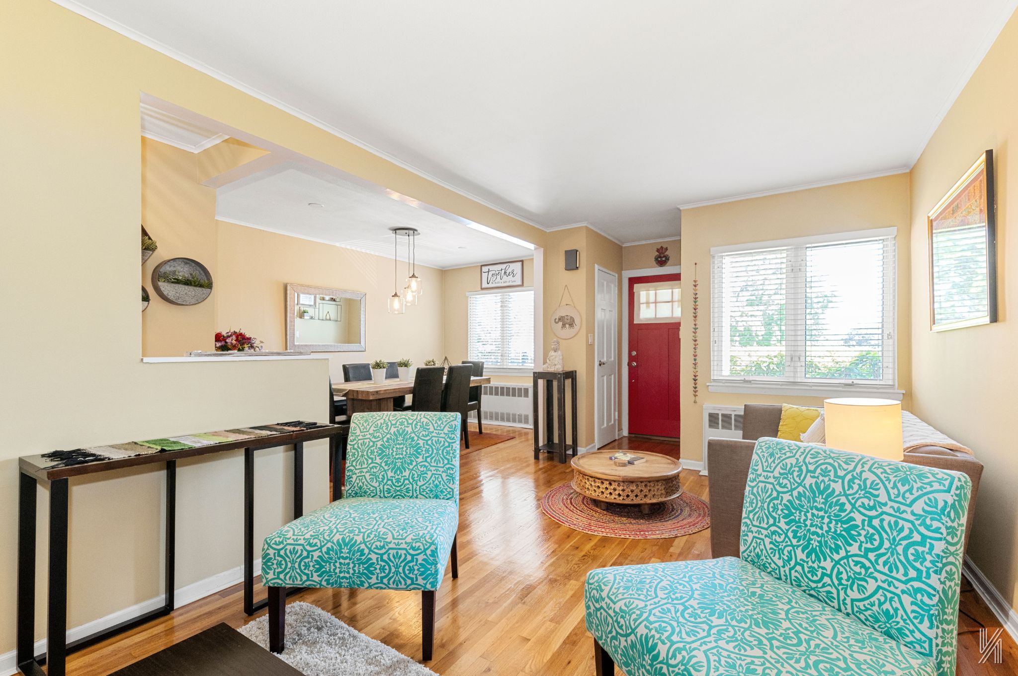 67-17 Eliot Avenue Queens, NY 11379 - Photo 5 of 21 a living room with furniture and a large window
