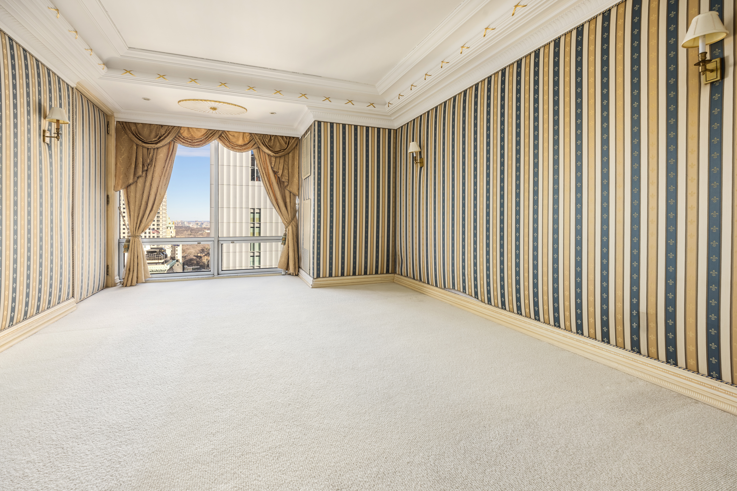 641 5th Avenue, Unit 27A Manhattan, NY 10022 - Photo 22 of 29 a view of an empty room with a window