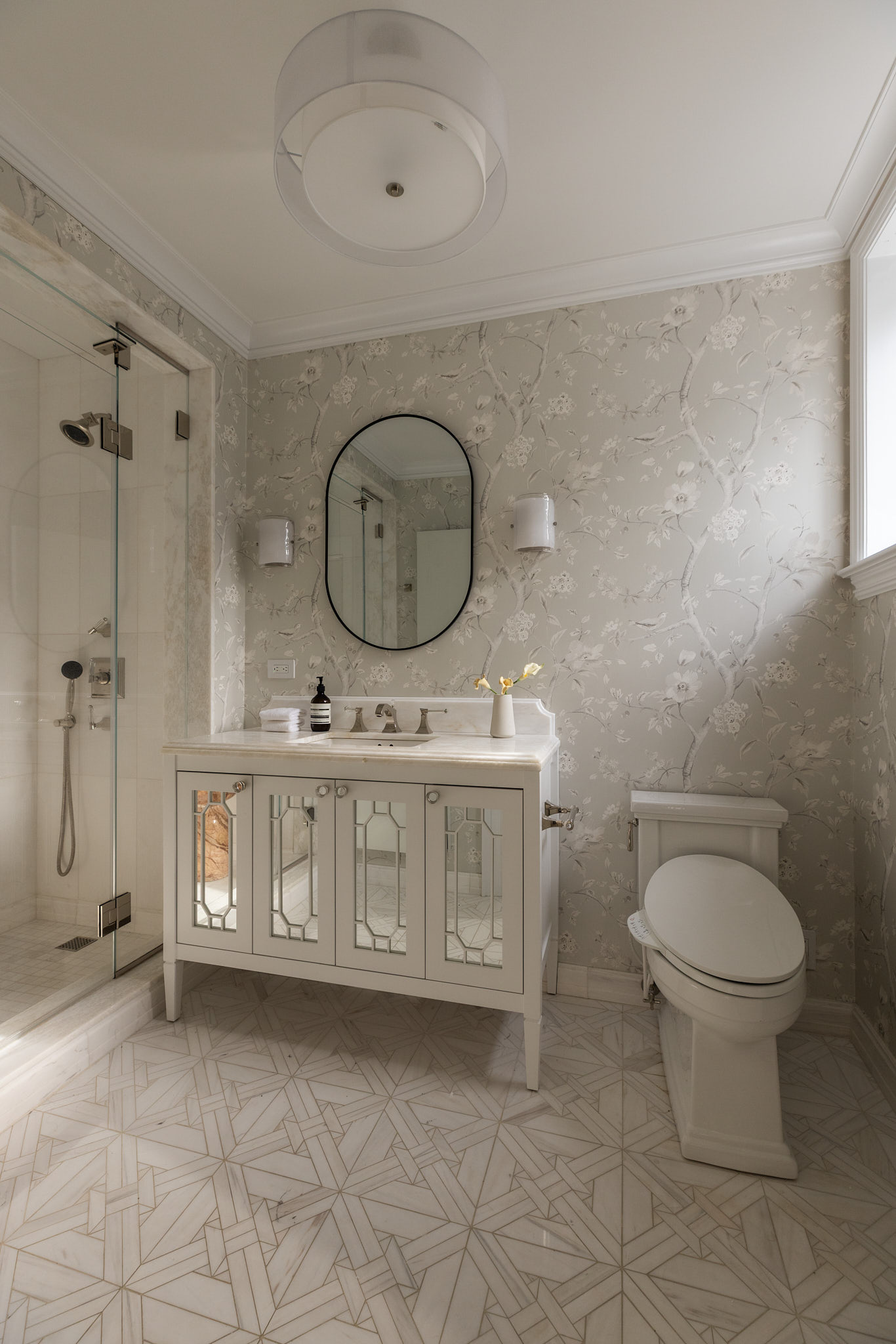 350 East 57th Street, Unit 15B Manhattan, NY 10022 - Photo 18 of 20 a bathroom with a toilet a sink and a shower
