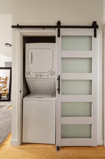 a utility room with washer and dryer