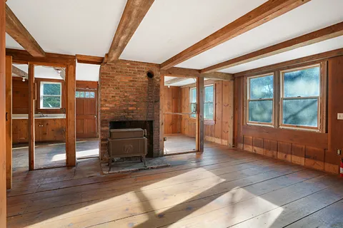 a view of an entryway with a fireplace