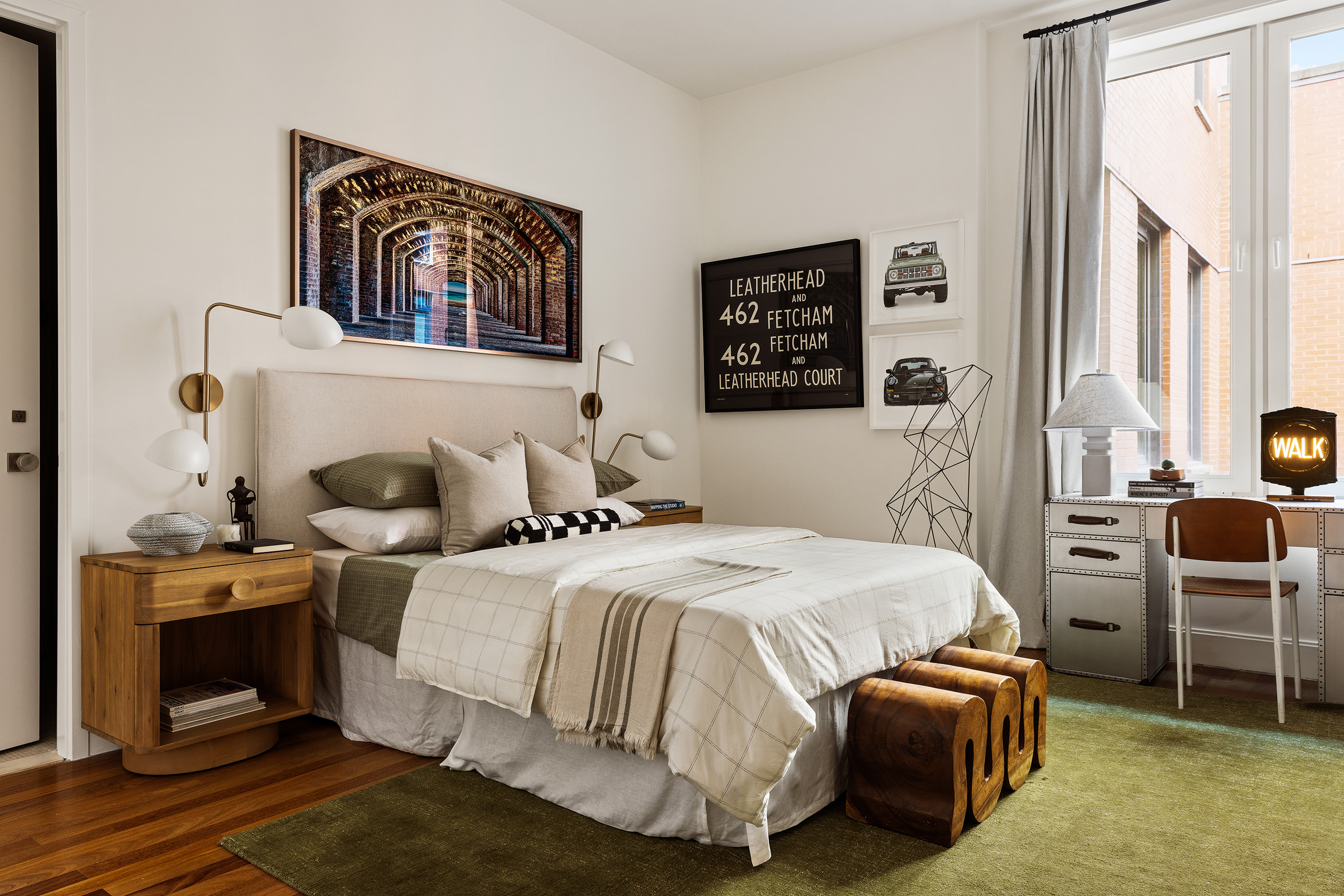 92 Laight Street, Unit 5E Manhattan, NY 10013 - Photo 22 of 26 a bedroom with a bed and a table