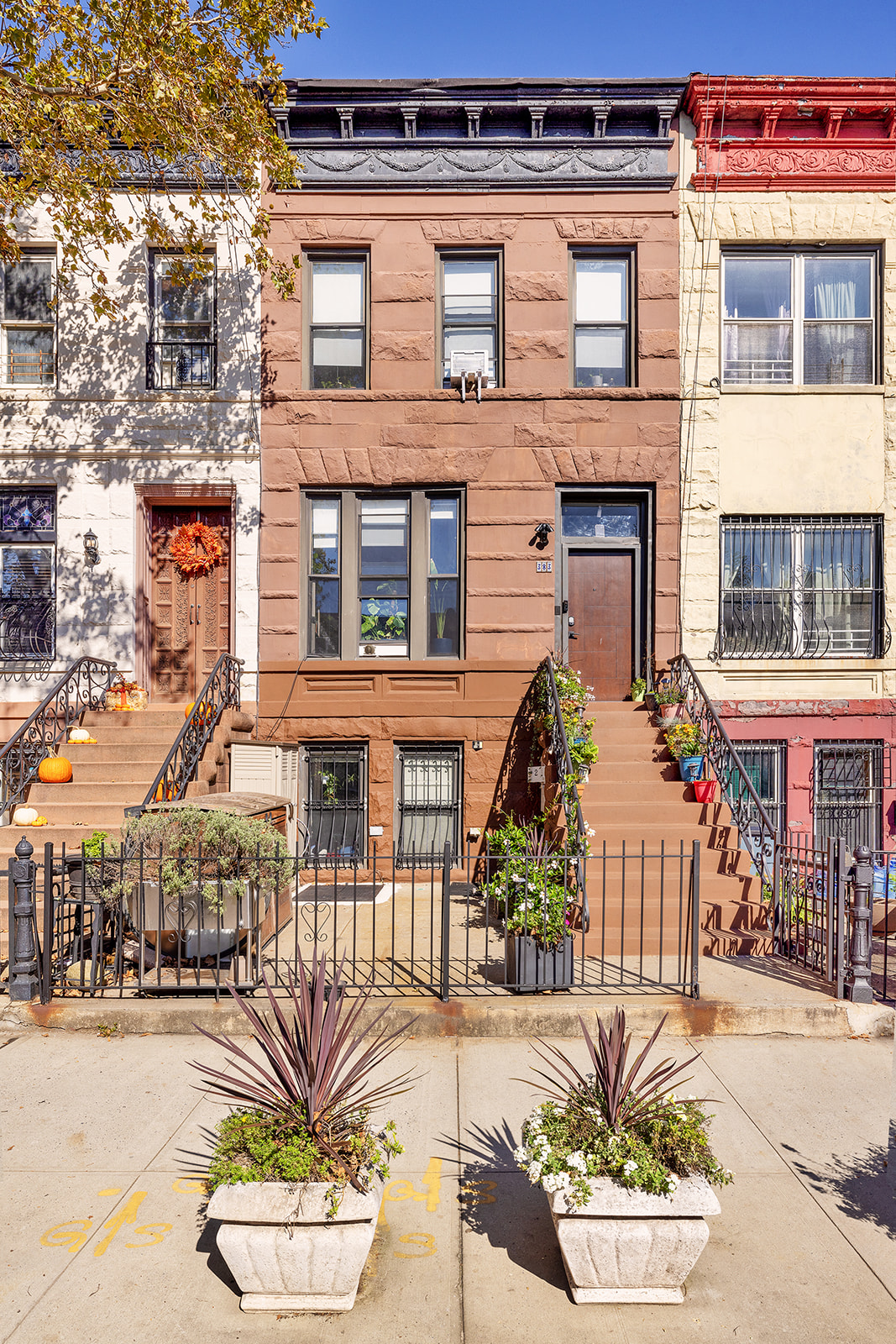 383 Bainbridge Street, Unit 1 Brooklyn, NY 11233 - Photo 13 of 14 front view of a house with a street