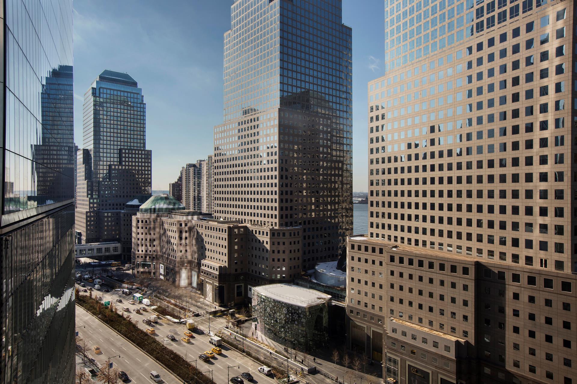 100 Barclay Street, Unit 13P Manhattan, NY 10007 - Photo 4 of 21 a view of a city with tall buildings