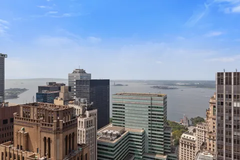 a view of a city with tall buildings