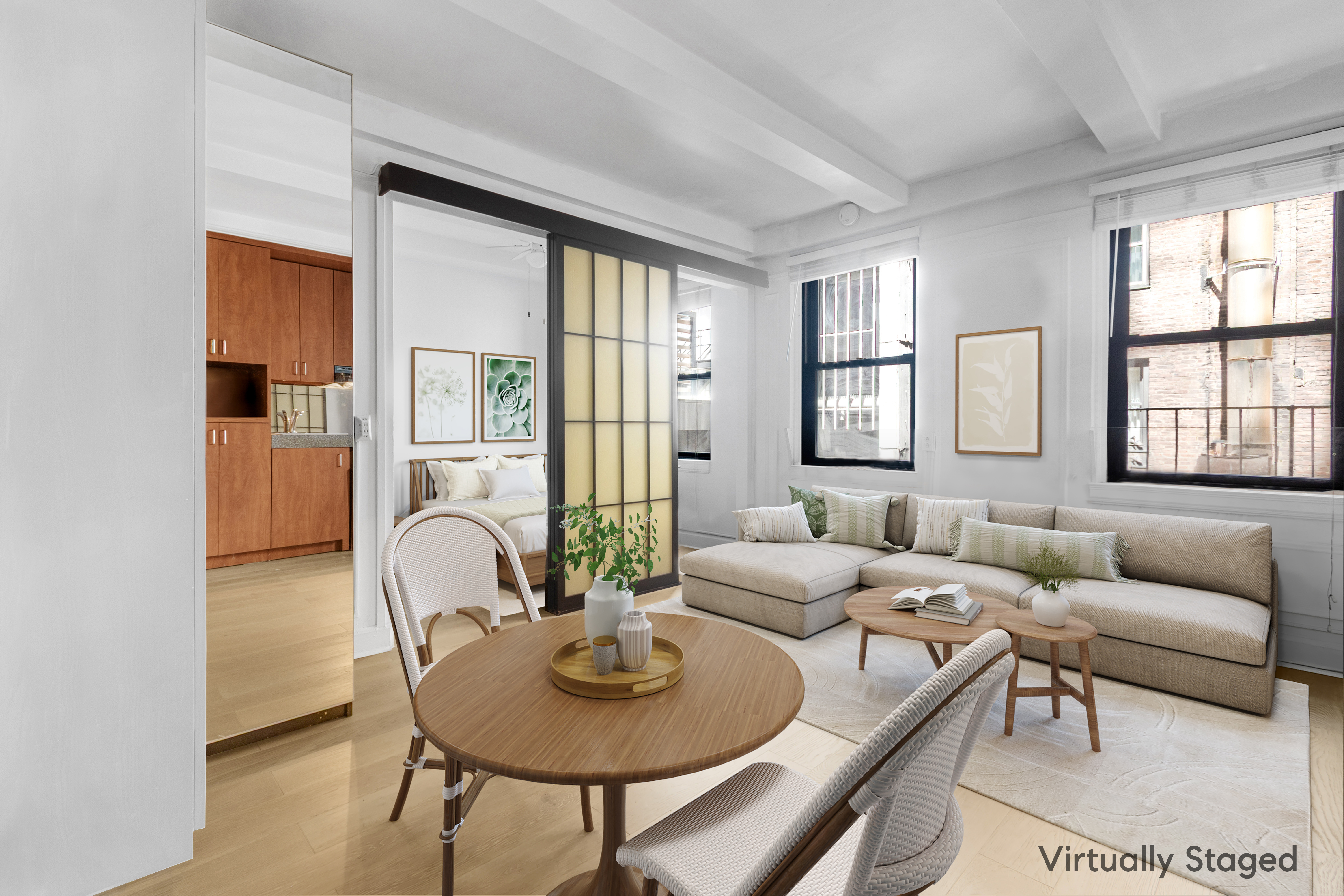 a living room with furniture and wooden floor