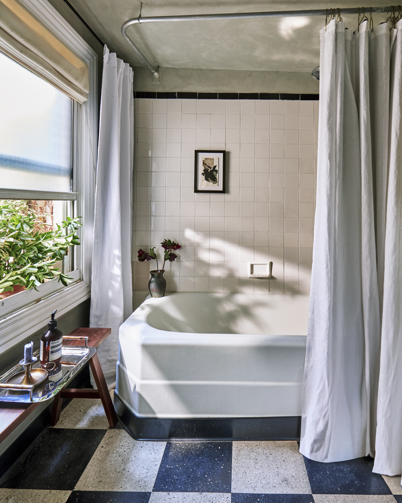 126 Washington Place, Unit 2 Manhattan, NY 10014 - Photo 12 of 14 a bathroom with a sink and a mirror
