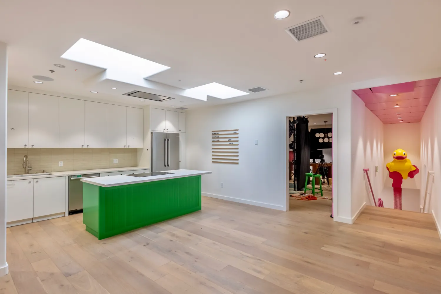 a room with stairs and white walls