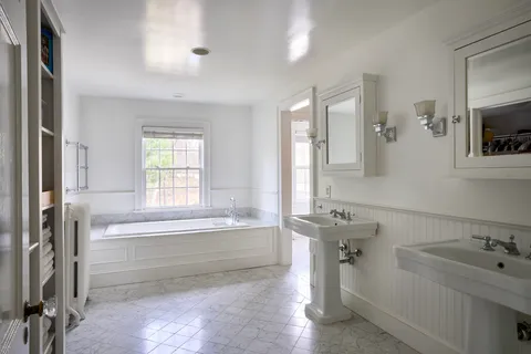 a bathroom with a sink and a bathtub