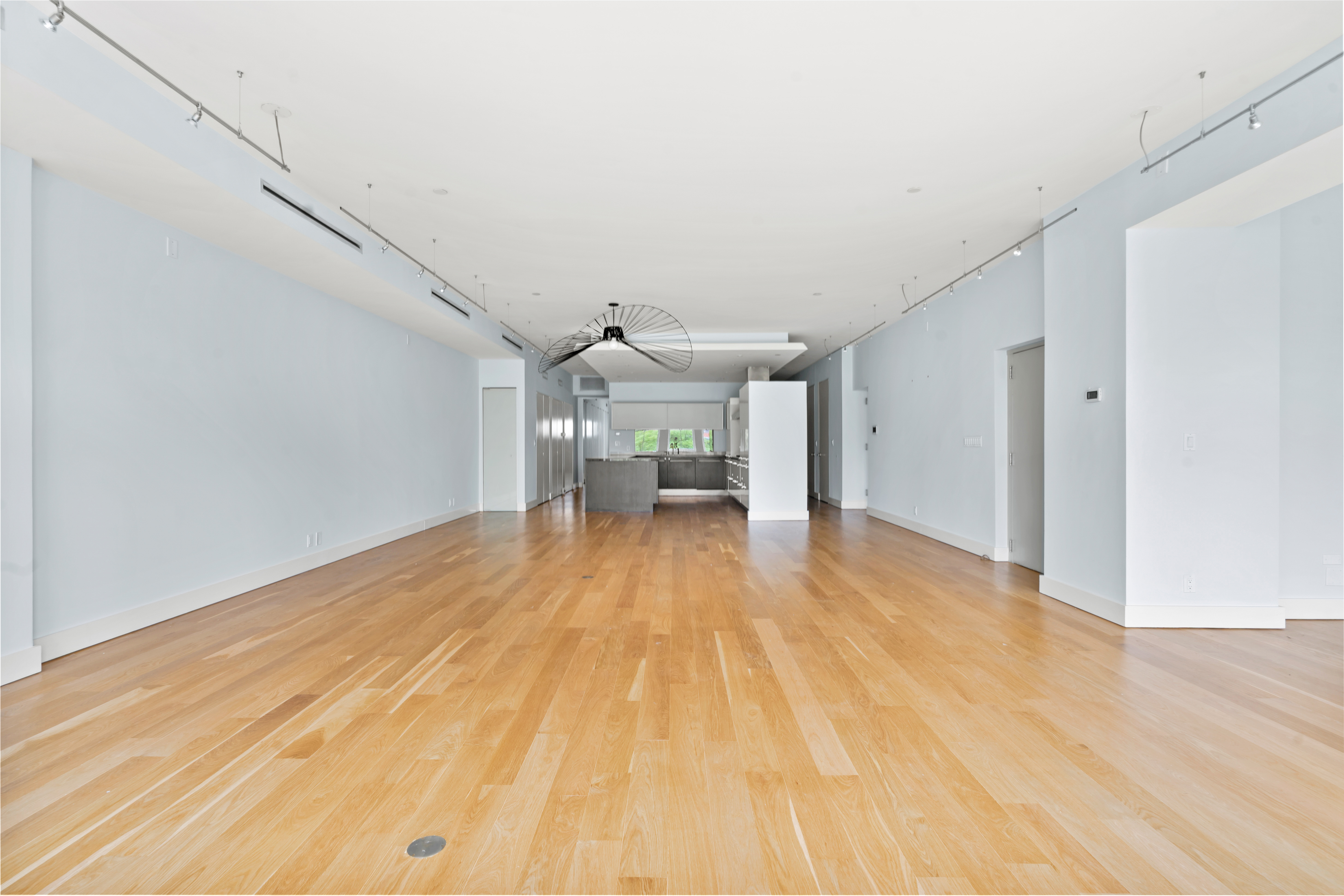 32 Laight Street, Unit 5 Manhattan, NY 10013 - Photo 12 of 31 a view of empty room with wooden floor