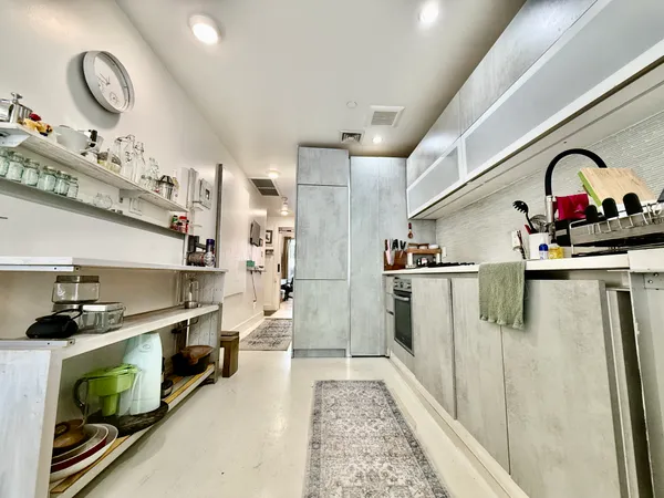 a view of a living room and front door