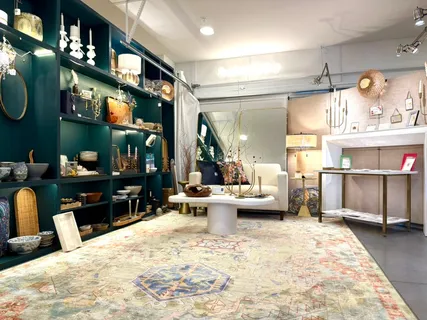 a living room with furniture a rug and a flat screen tv