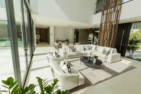 a living room with patio furniture