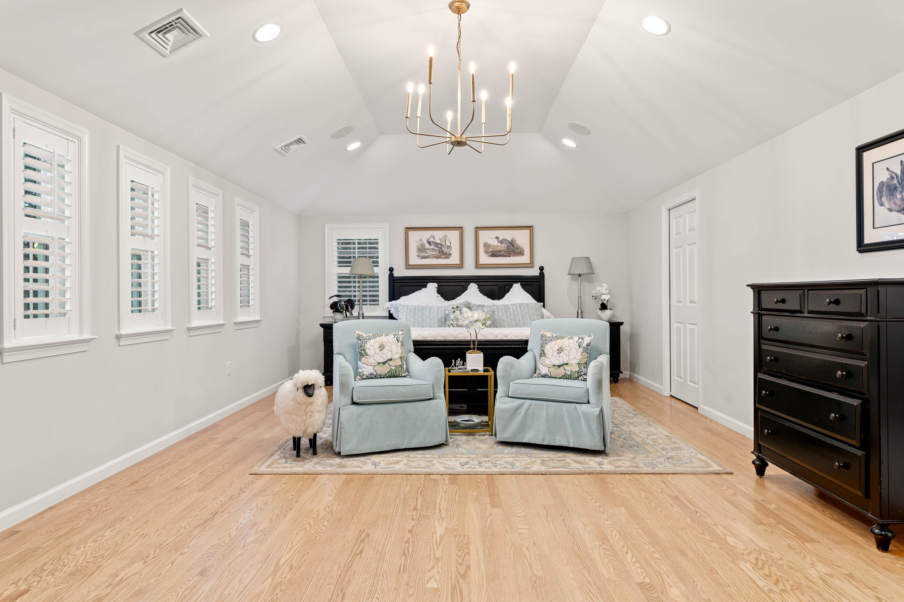 710 South Valley Forge Road Devon, PA 19333 - Photo 18 of 47 a living room with furniture a chandelier and a flat screen tv