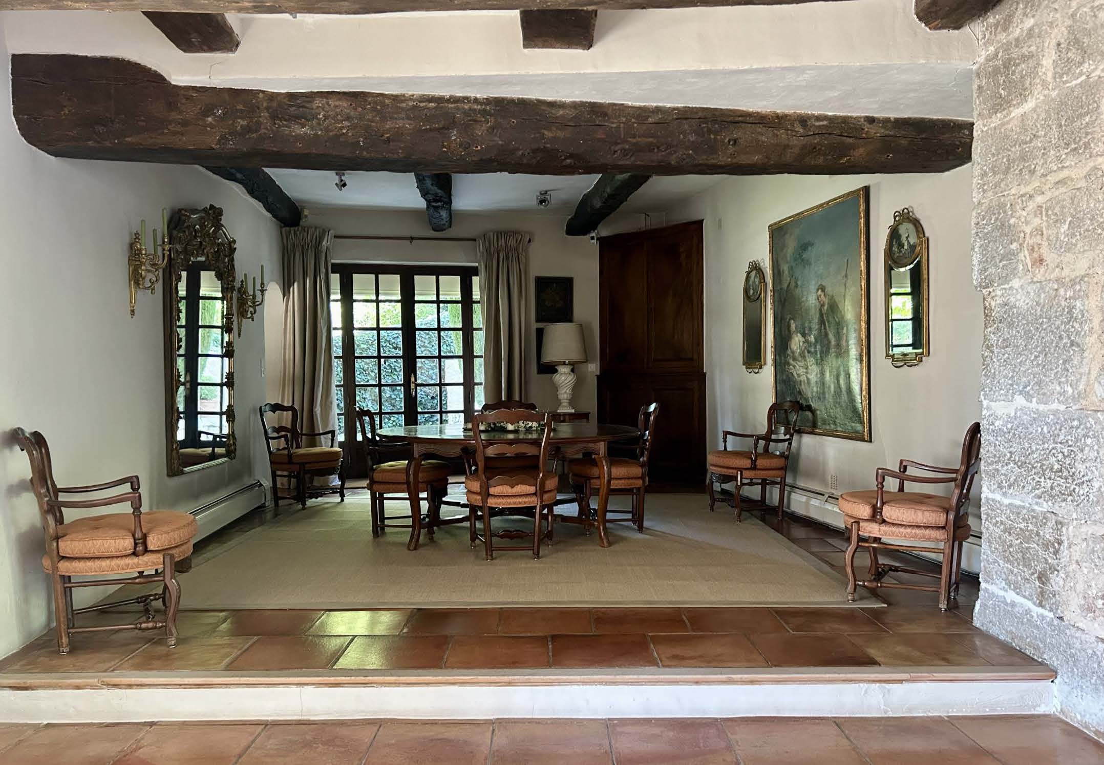 Le Vieux Moulin Provence-Alpes-Côte d’Azur, undefined 83630 - Photo 10 of 21 a view of a livingroom and dining room with furniture wooden floor and a rug