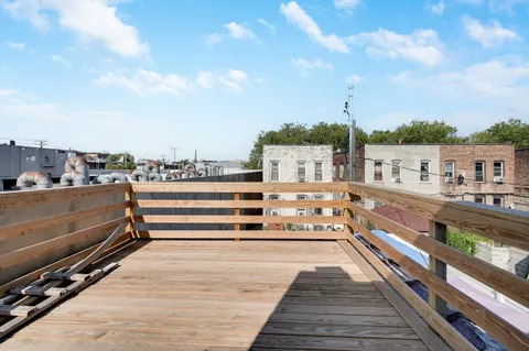 a balcony with a city view