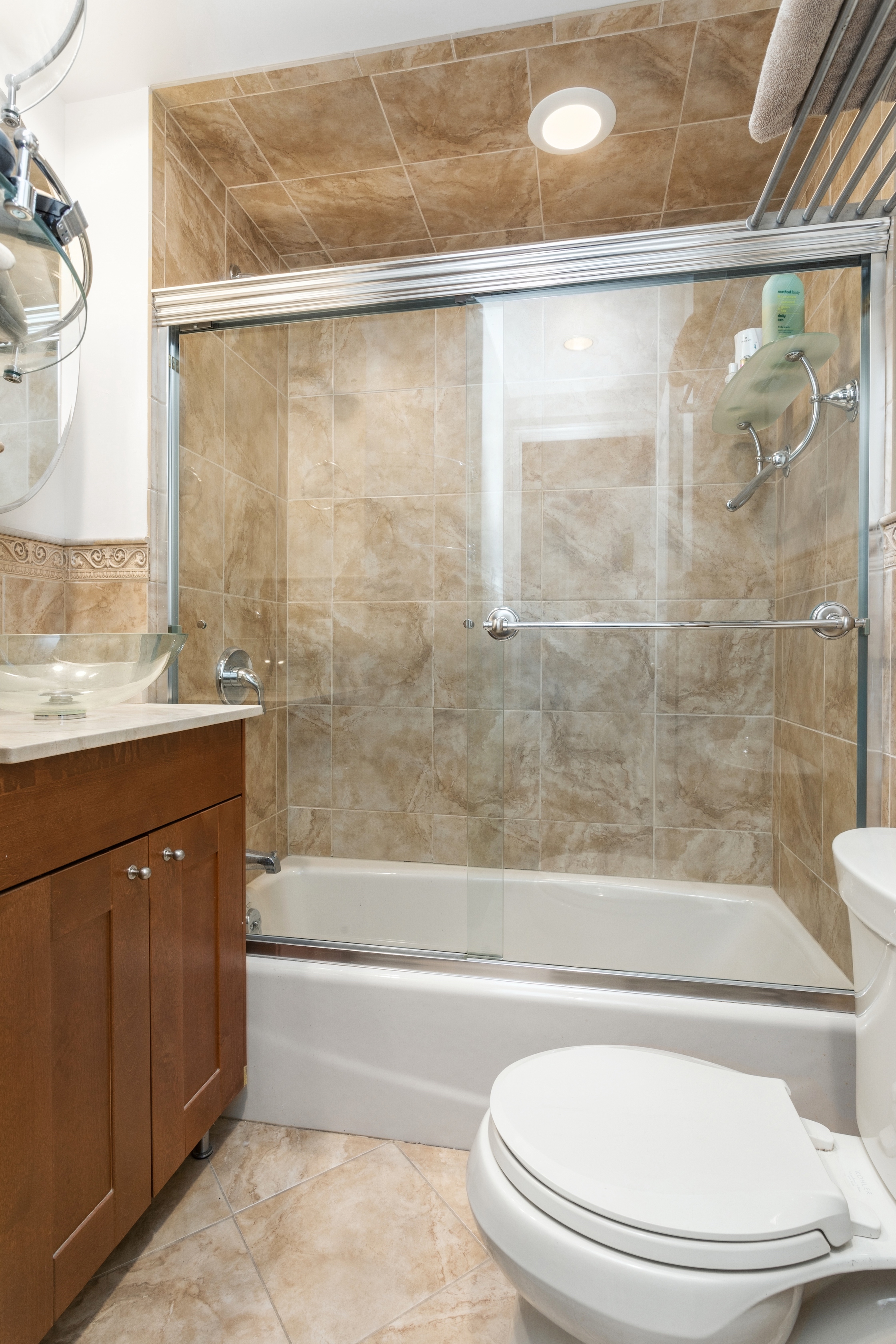 258 West 71st Street, Unit BR Manhattan, NY 10023 - Photo 3 of 13 a bathroom with a sink a mirror and a bathtub