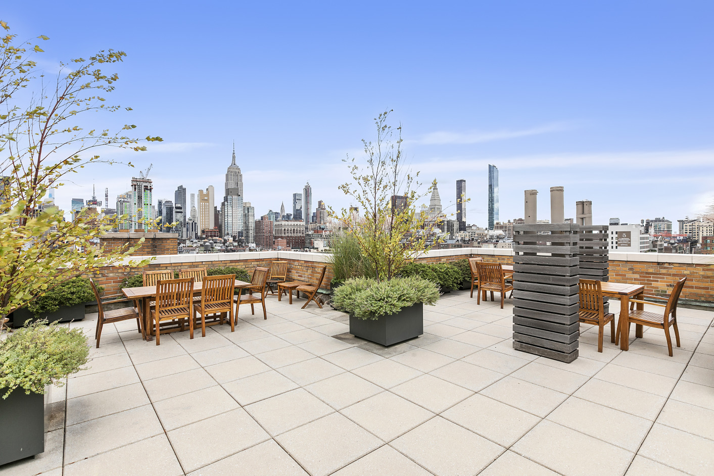 161 West 16th Street, Unit 6E Manhattan, NY 10011 - Photo 13 of 15 a terrace with a seating space