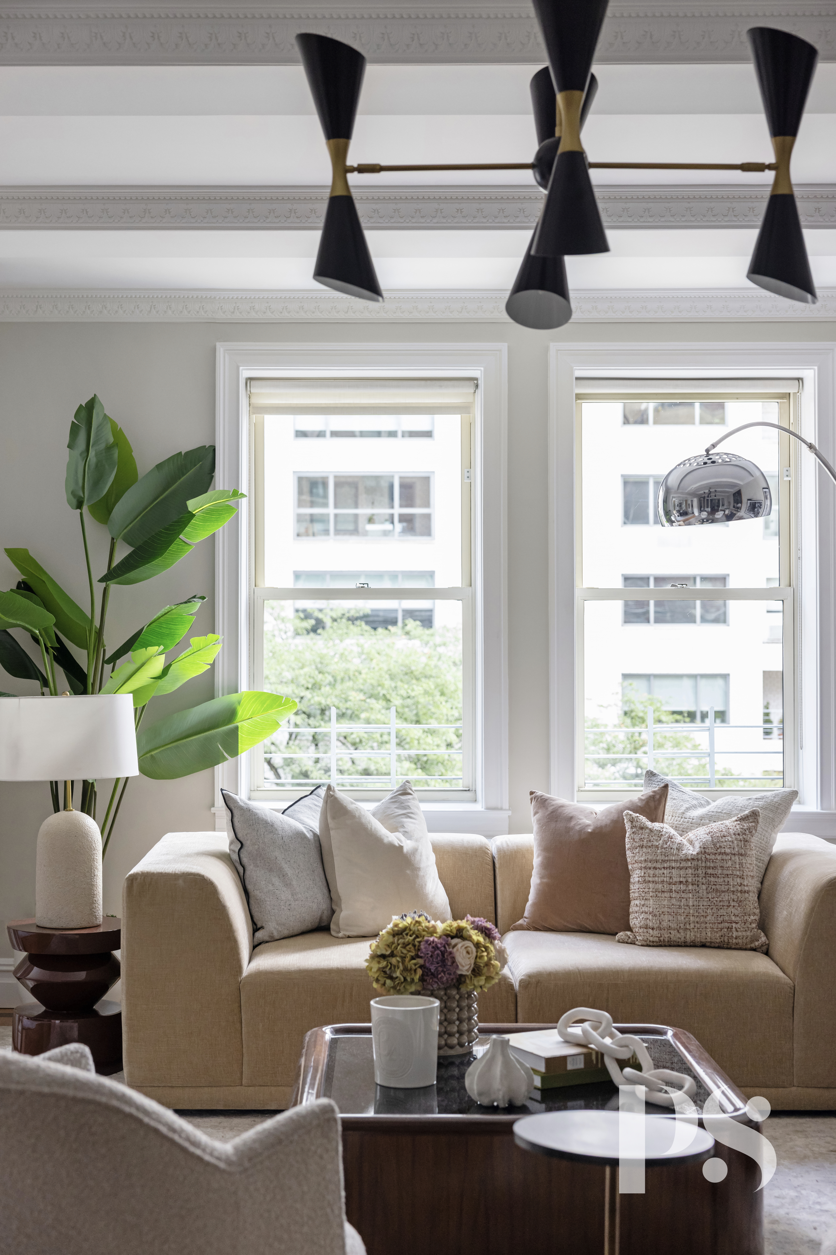 610 Park Avenue, Unit 4B Manhattan, NY 10065 - Photo 2 of 22 a living room with furniture and a large window