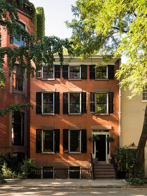 a front view of a building with street view
