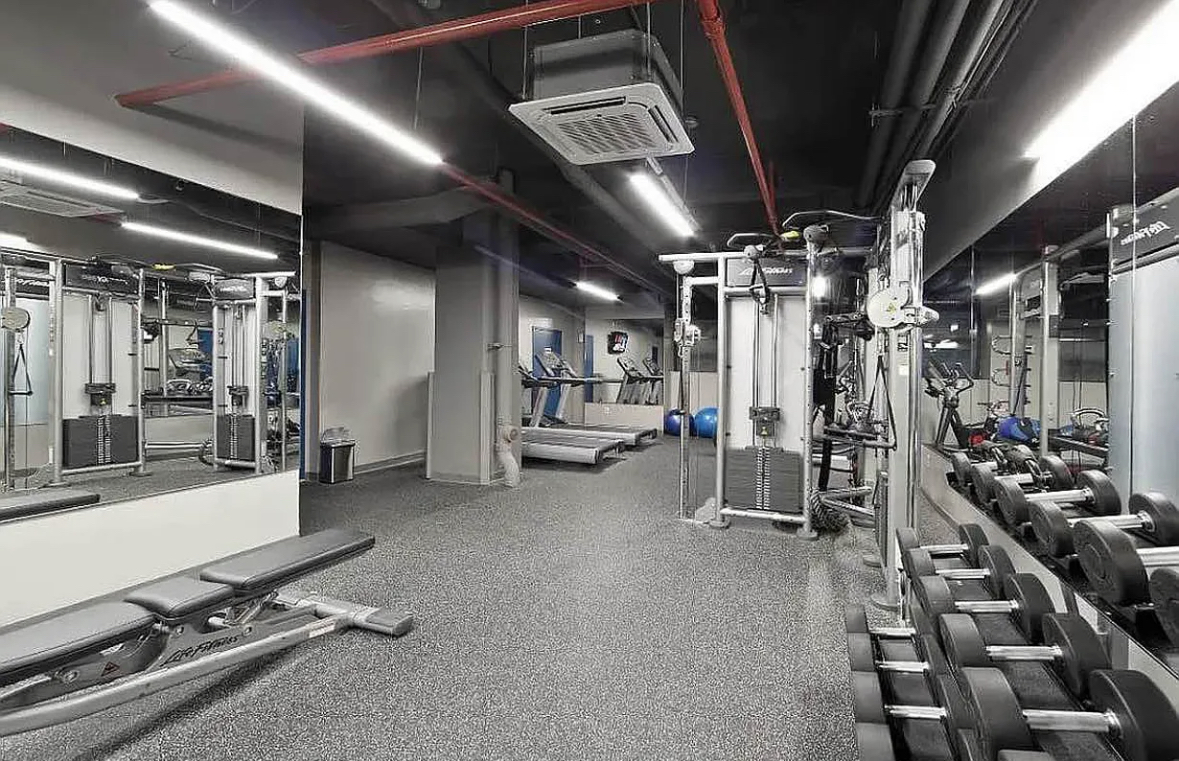 44 Berry Street, Unit 6B Brooklyn, NY 11249 - Photo 7 of 9 a view of a room with gym equipment