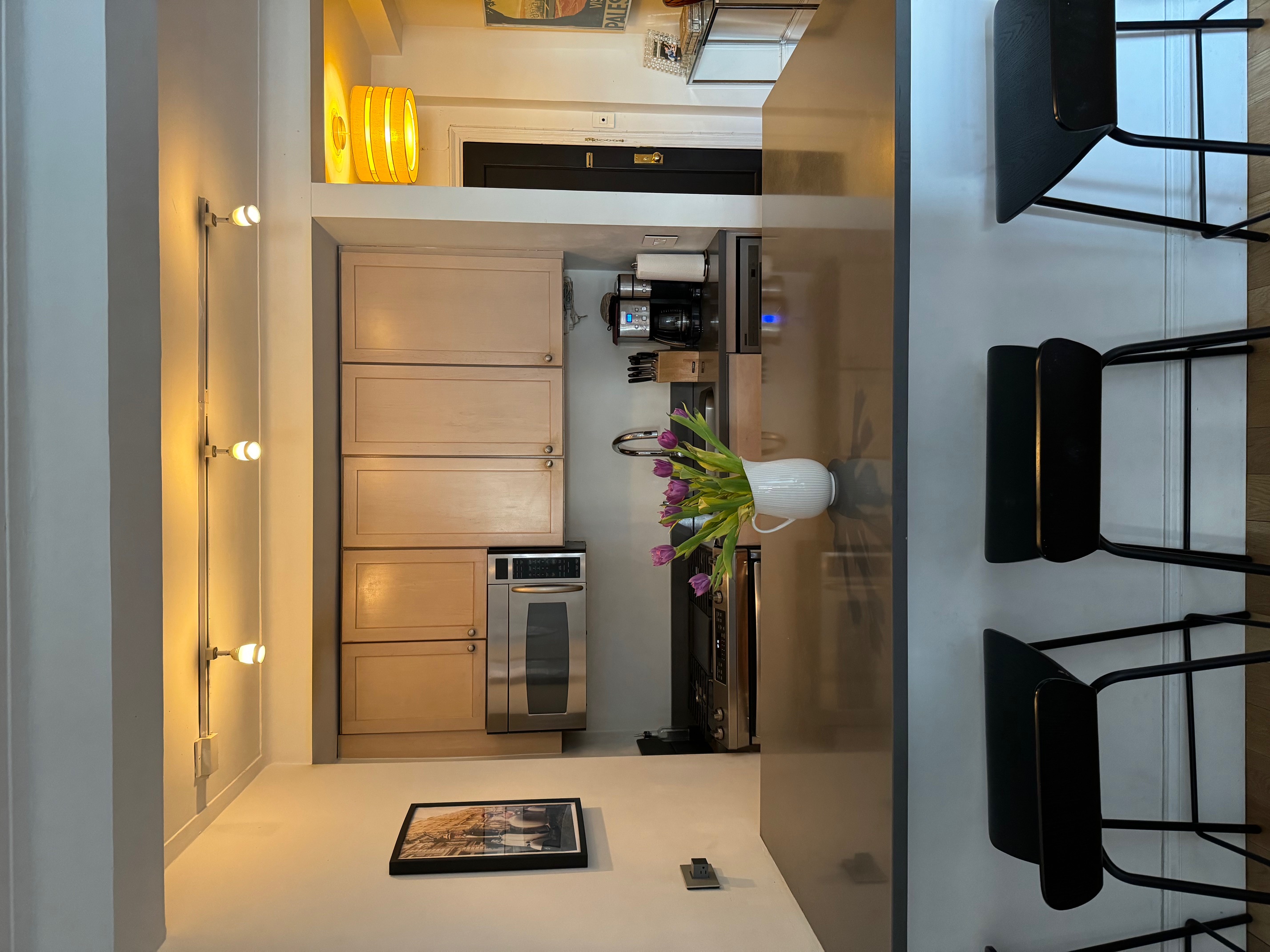 433 West 34th Street, Unit 6K Manhattan, NY 10001 - Photo 7 of 12 a kitchen with a sink cabinets and window
