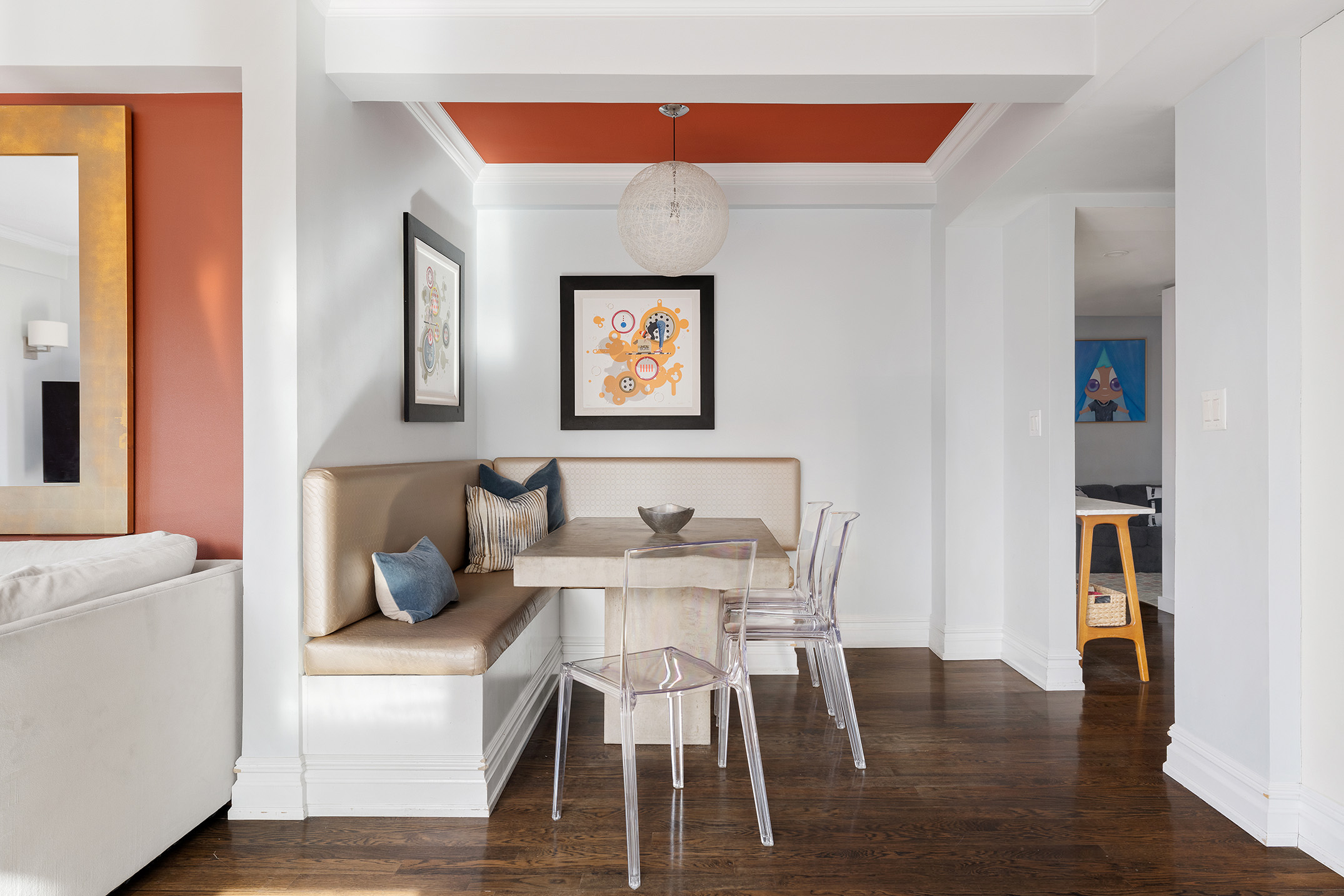 136 East 76th Street, Unit 16DE Manhattan, NY 10021 - Photo 4 of 14 a view of a dining room with furniture and wooden floor