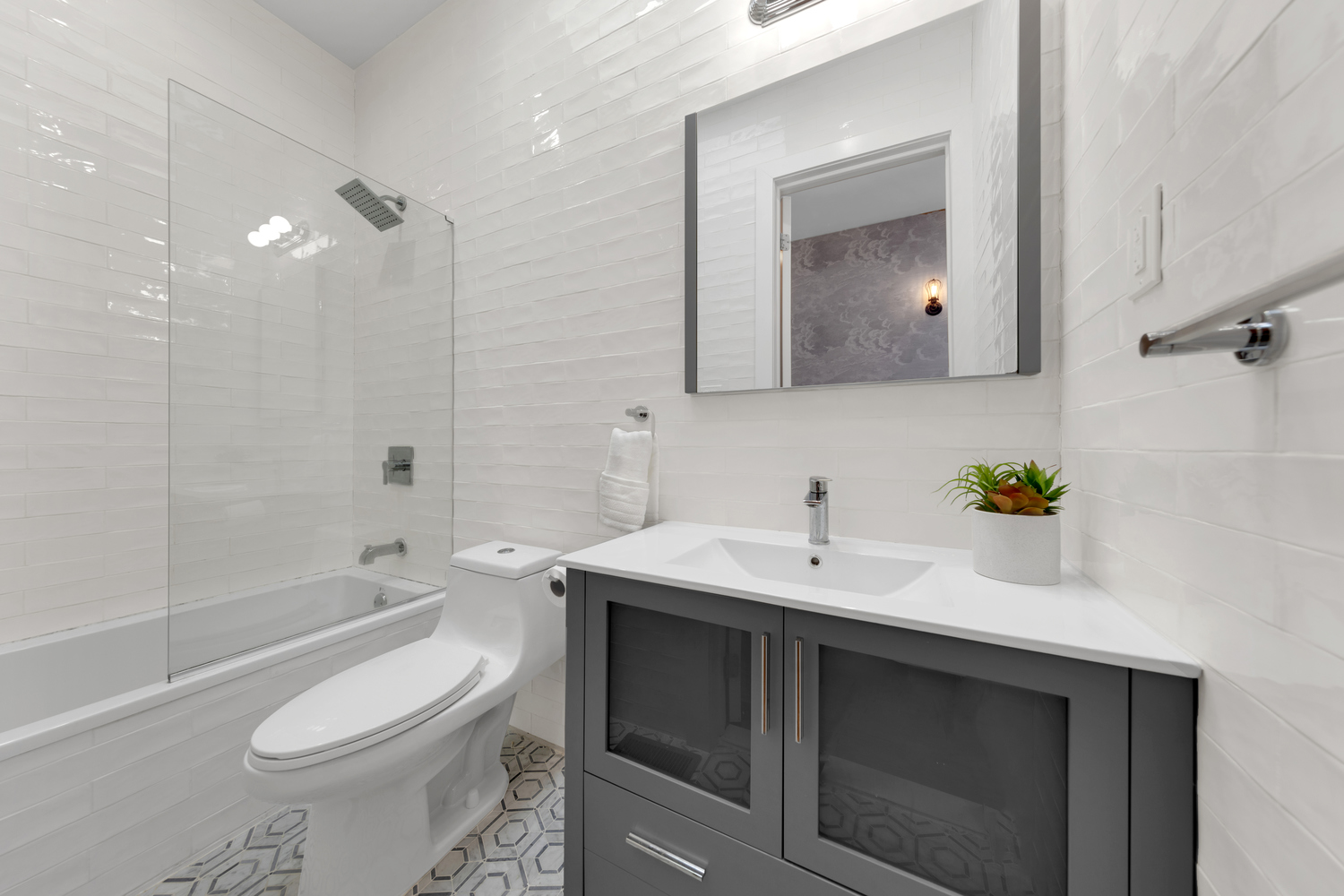 1118 Decatur Street Brooklyn, NY 11207 - Photo 11 of 18 a bathroom with a sink toilet and shower