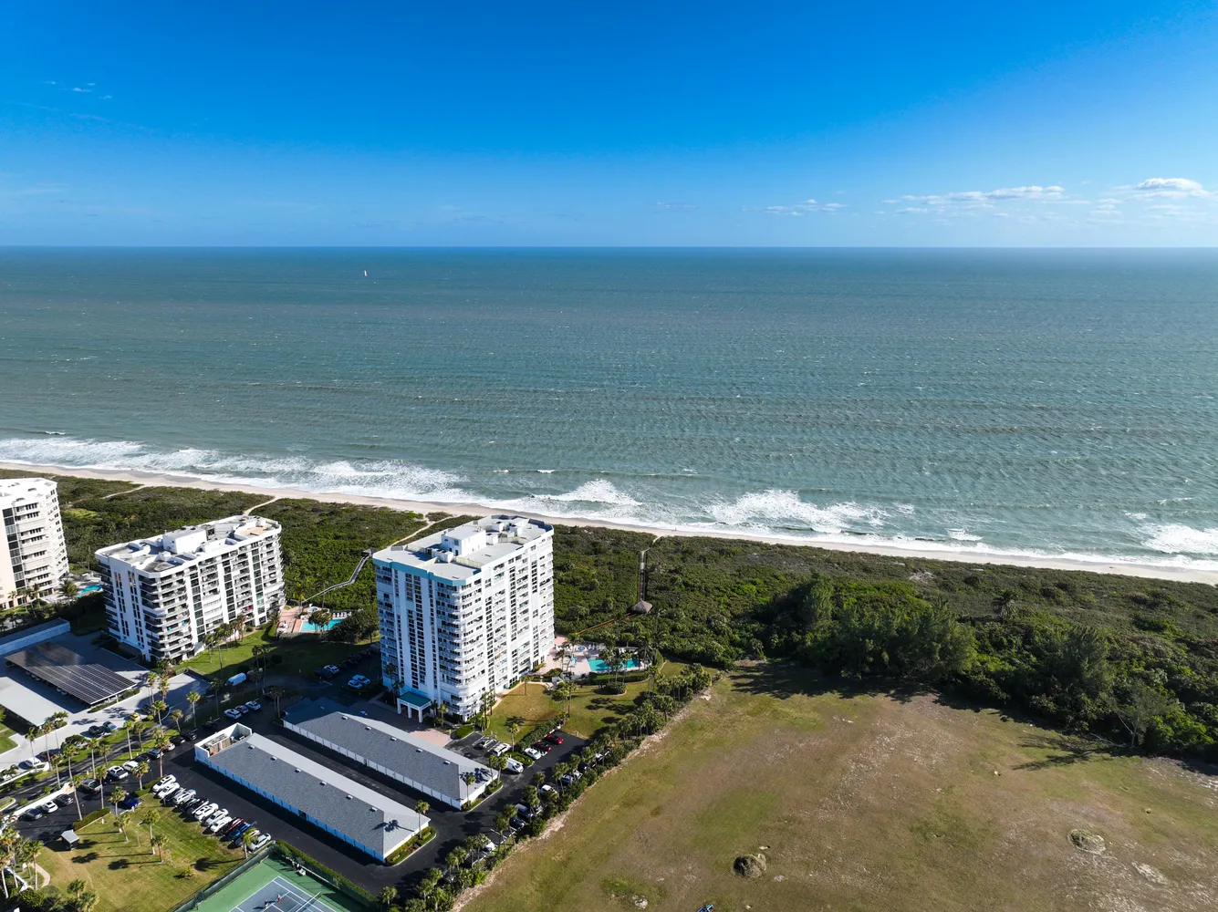 a view of a balcony with an ocean view