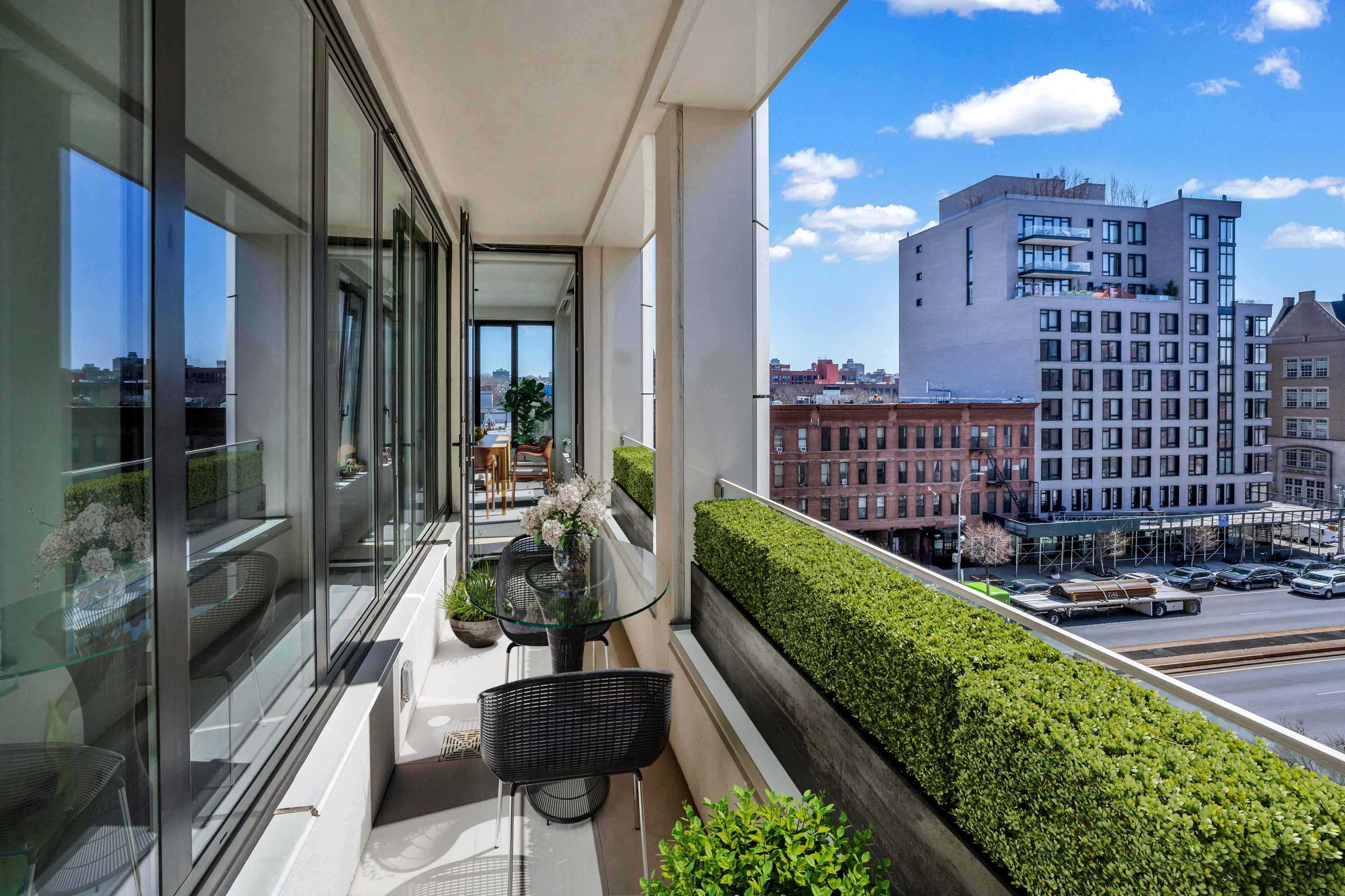 58 St Marks Place, Unit 608 Brooklyn, NY 11217 - Photo 6 of 22 a view of a balcony with chairs