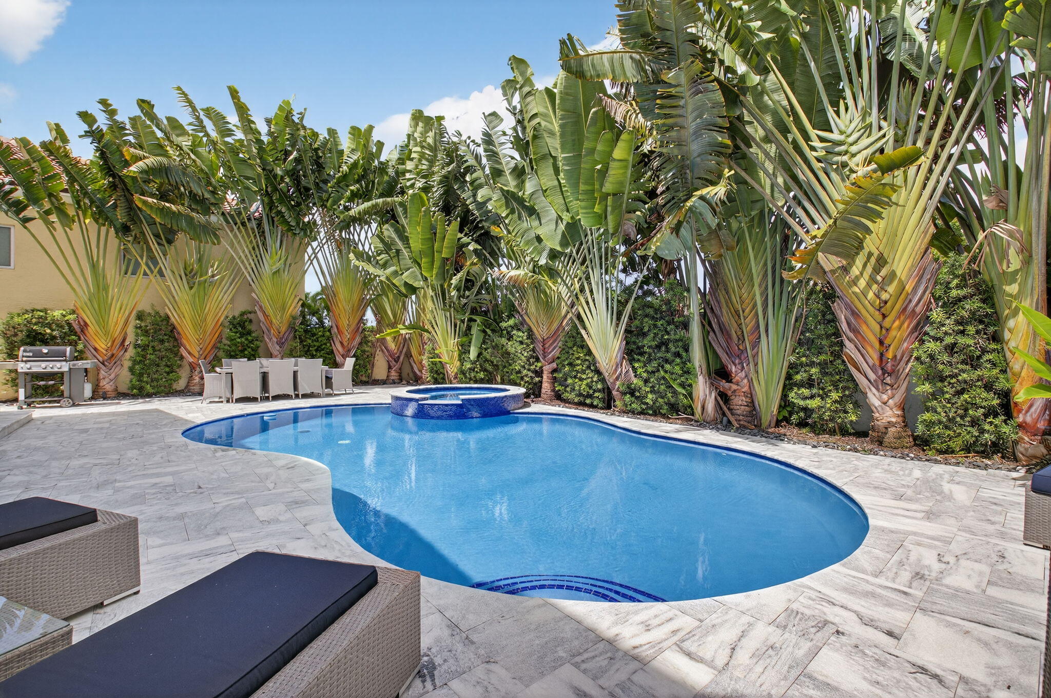 6529 Somerset Circle Boca Raton, FL 33496 - Photo 39 of 75 a view of a swimming pool with an outdoor space