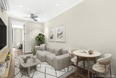 106 Bedford Avenue, Unit 3L Brooklyn, NY 11249 - Photo 6 of 7 a living room with furniture and a chandelier