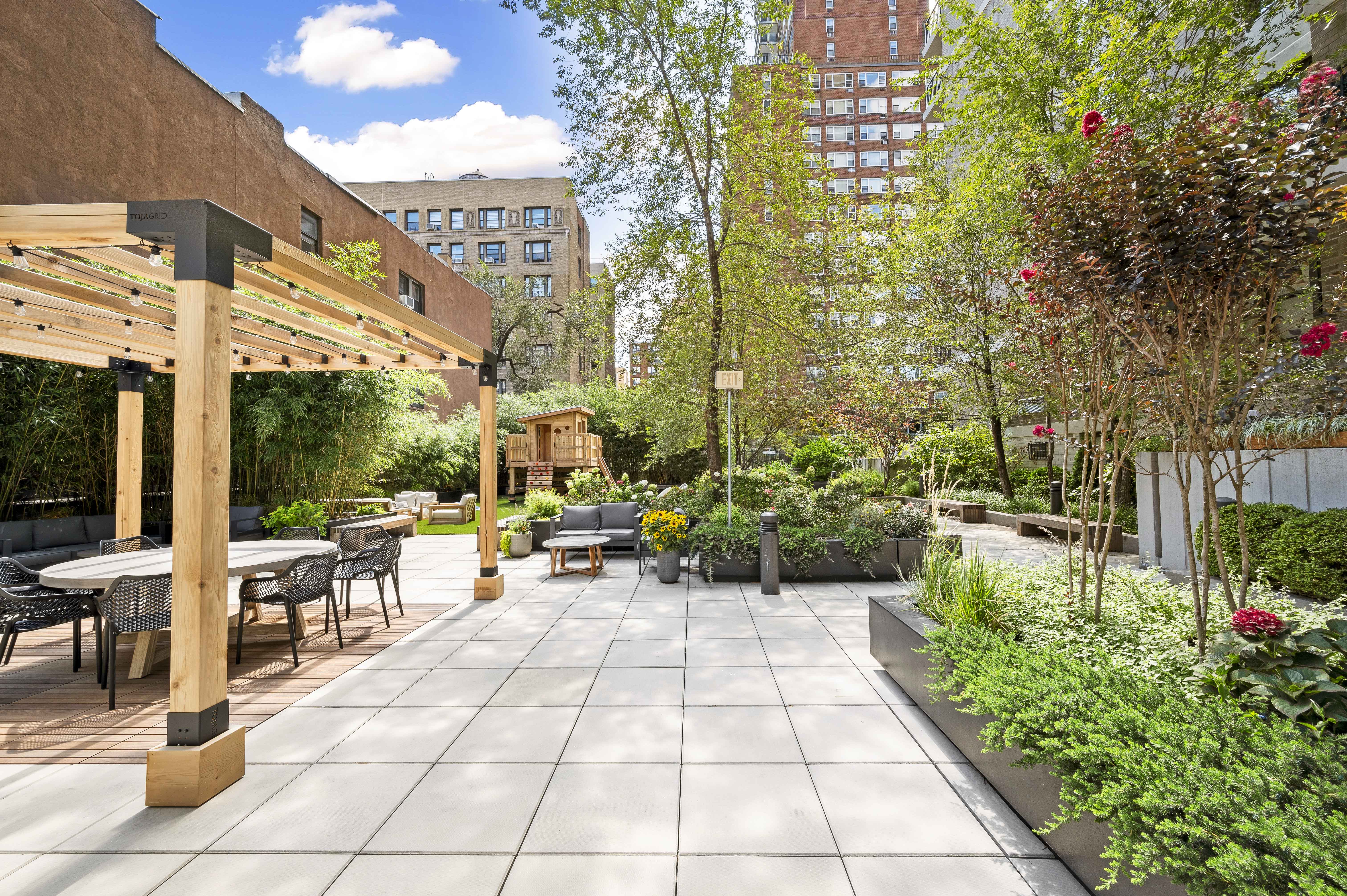 175 West 95th Street, Unit 15D Manhattan, NY 10025 - Photo 10 of 13 a view of a patio with table and chairs potted plants and large tree