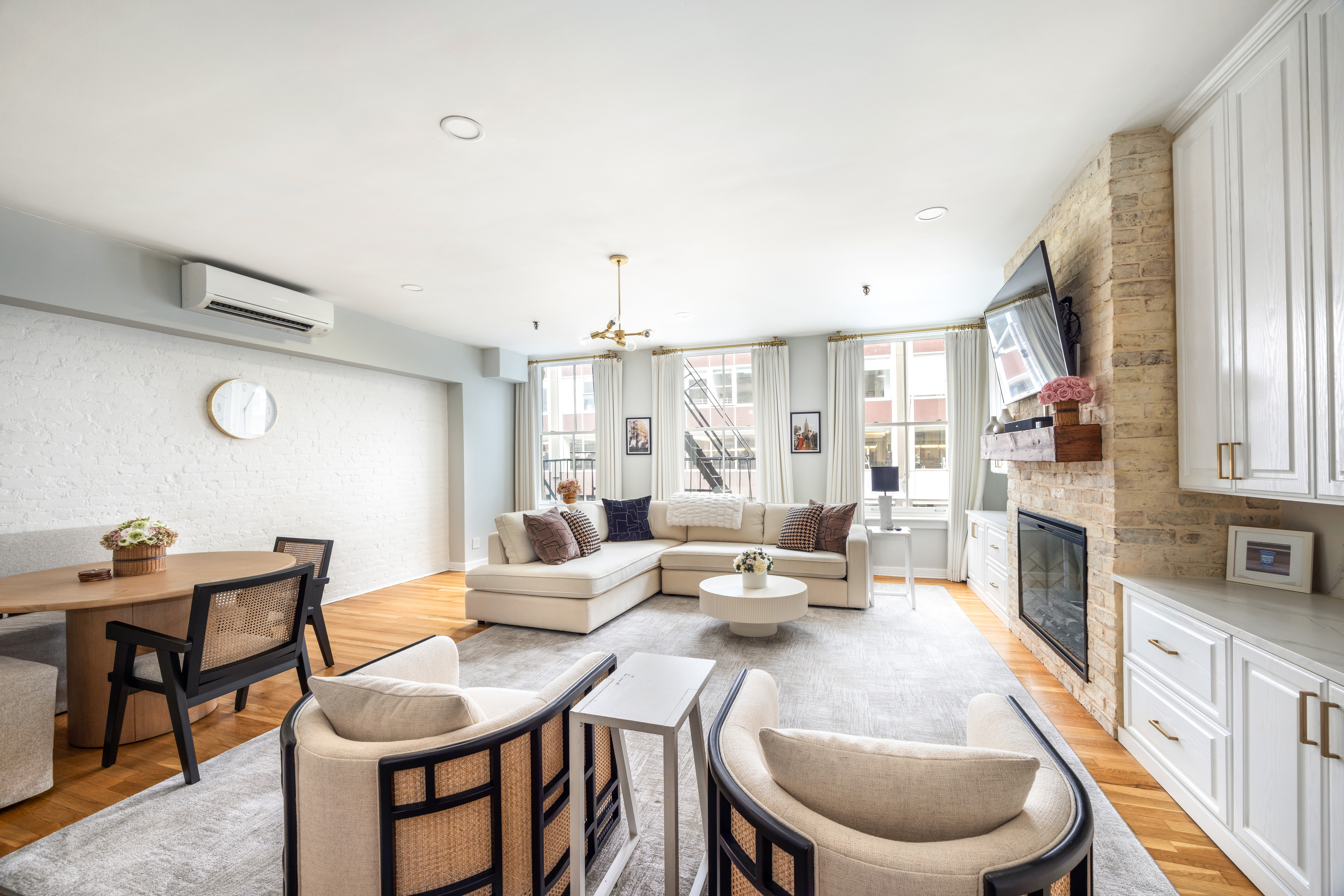 43 Murray Street, Unit Undisclosed Manhattan, NY 10007 - Photo 2 of 12 a large kitchen with a table and chairs