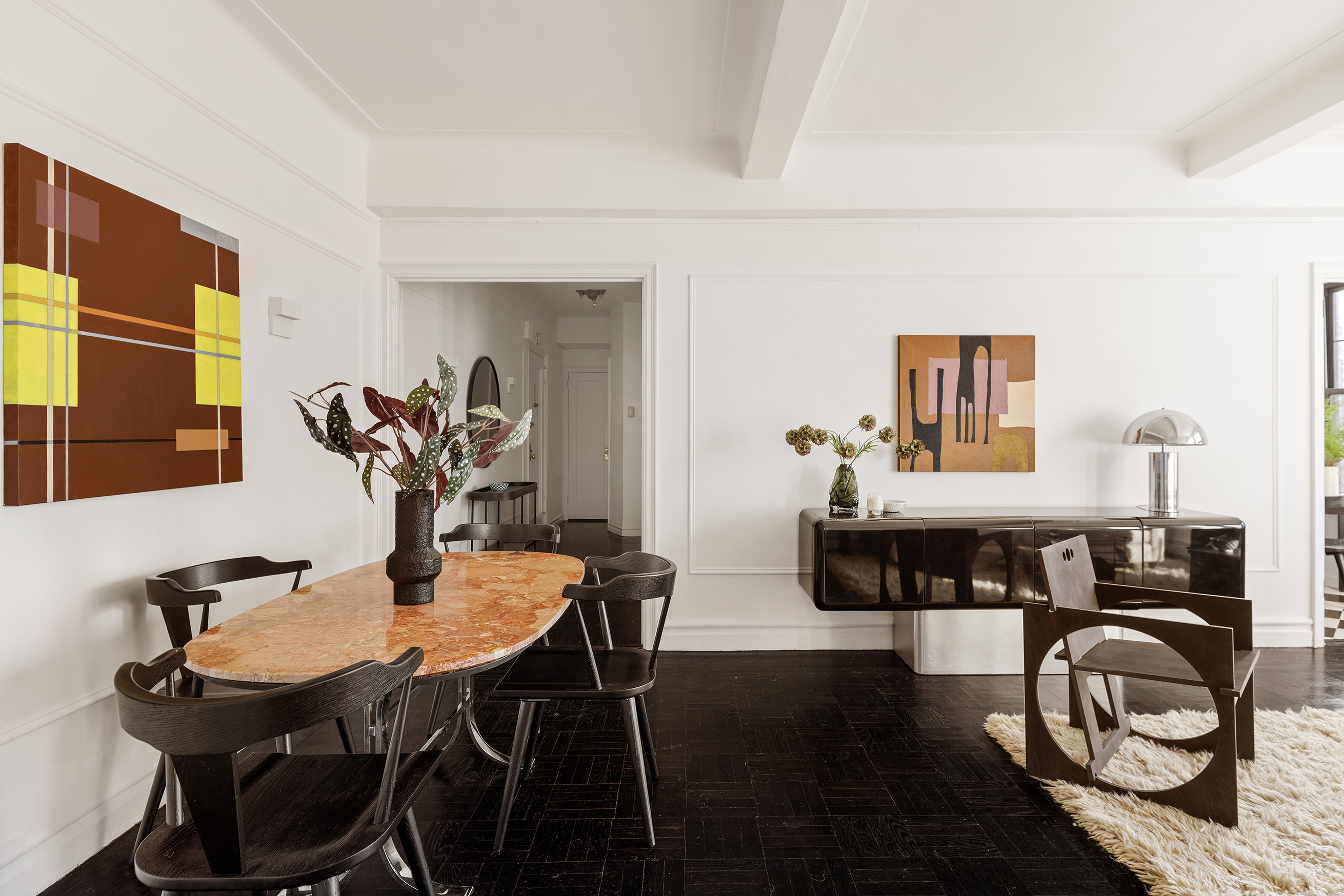 141 East 3rd Street, Unit 5H Manhattan, NY 10009 - Photo 3 of 12 a view of a dining room with furniture and wooden floor