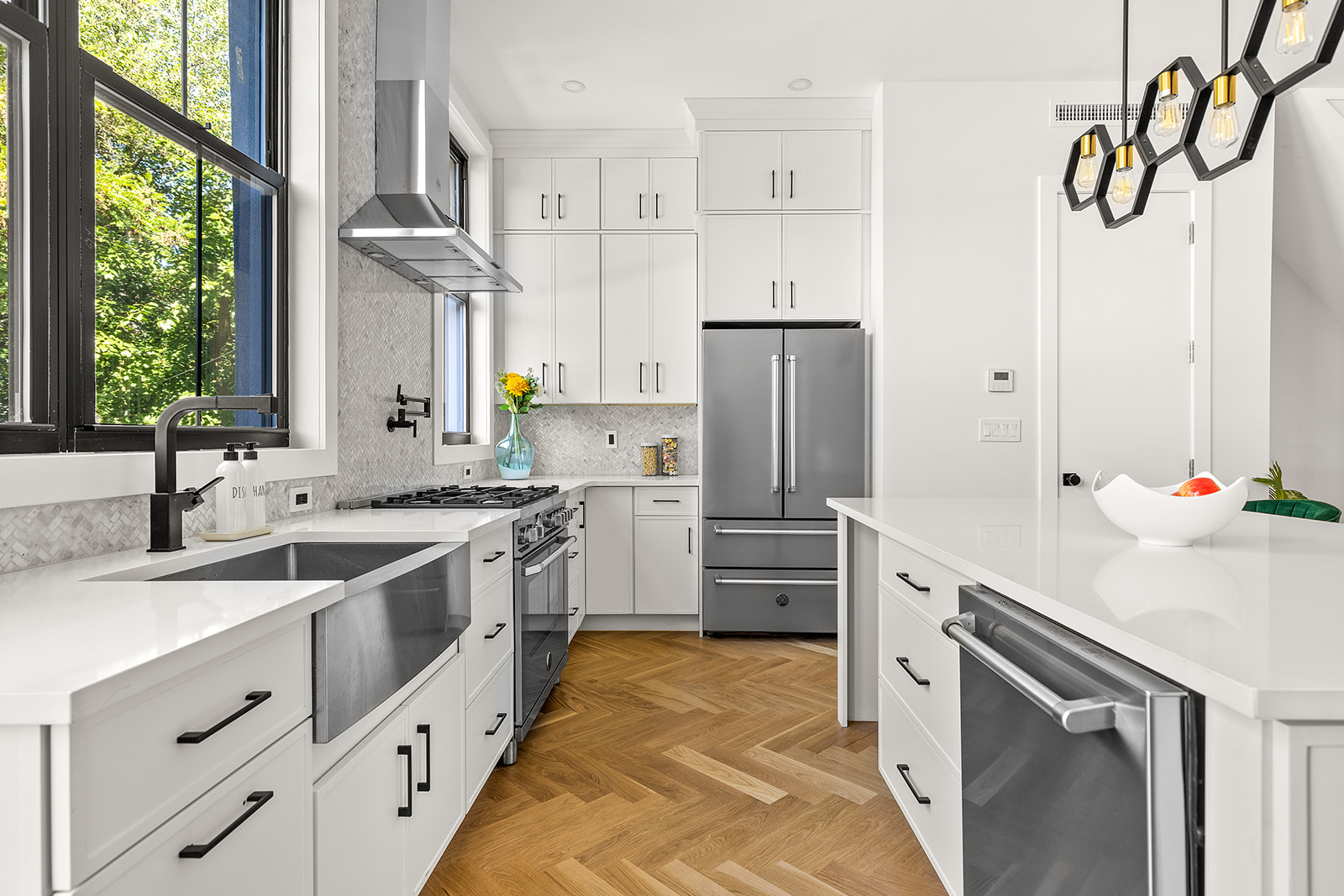 661 Decatur Street Brooklyn, NY 11233 - Photo 5 of 13 a kitchen with a sink stove and refrigerator