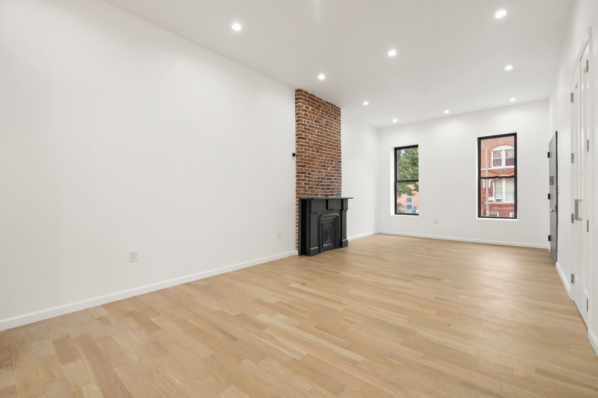 448 Halsey Street, Unit 1 Brooklyn, NY 11233 - Photo 3 of 22 a view of an empty room with a window