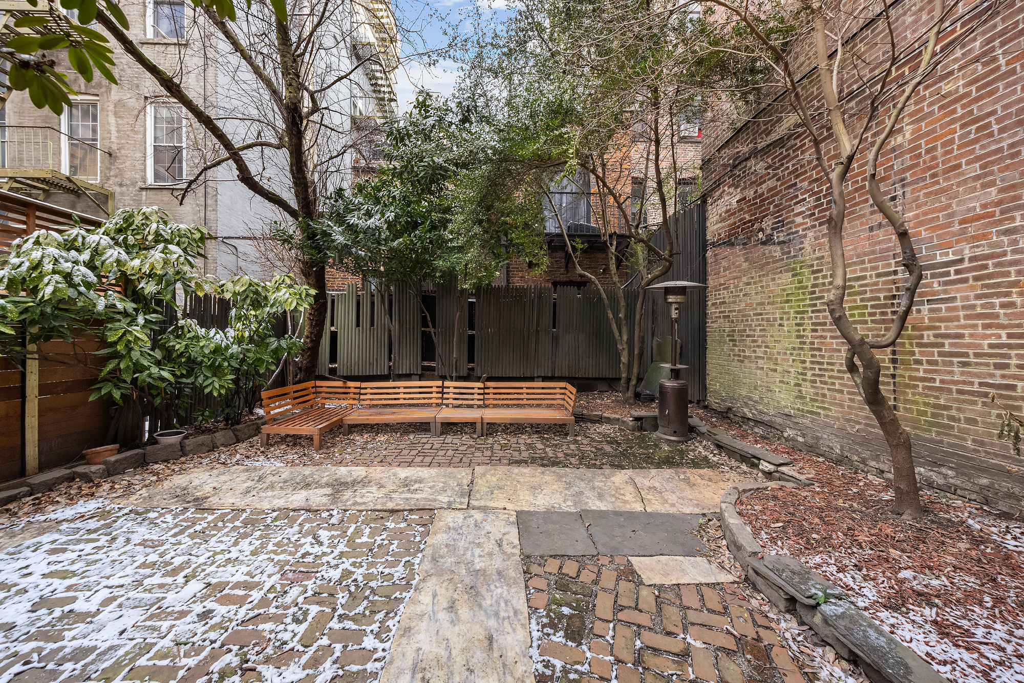 262 West 11th Street Manhattan, NY 10014 - Photo 21 of 27 a view of a yard with plants and trees