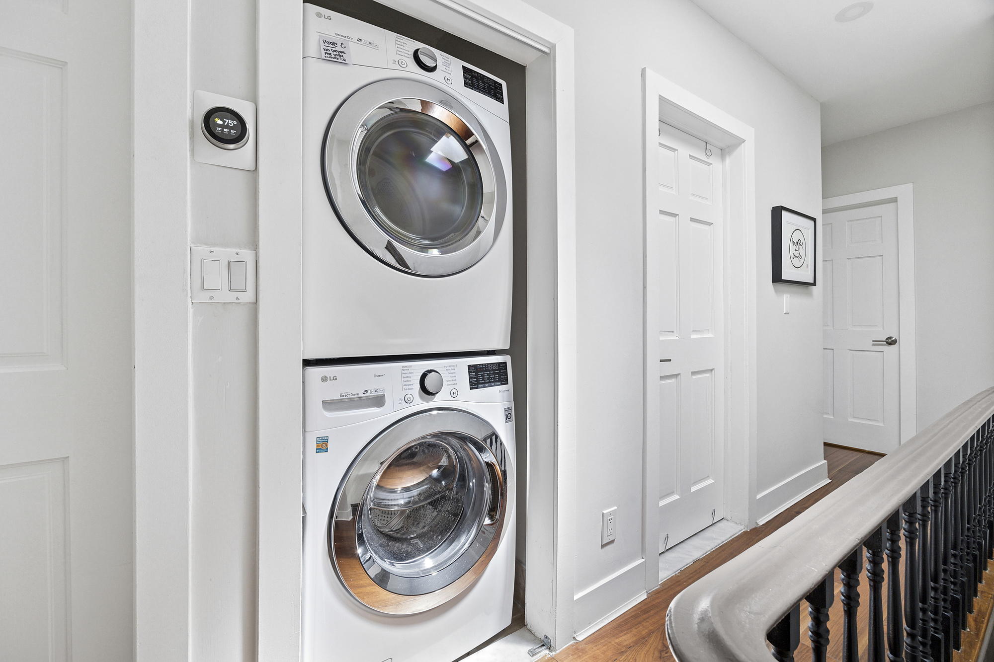 347 Bainbridge Street, Unit 2 Brooklyn, NY 11233 - Photo 10 of 12 a view of a hallway with washer and dryer