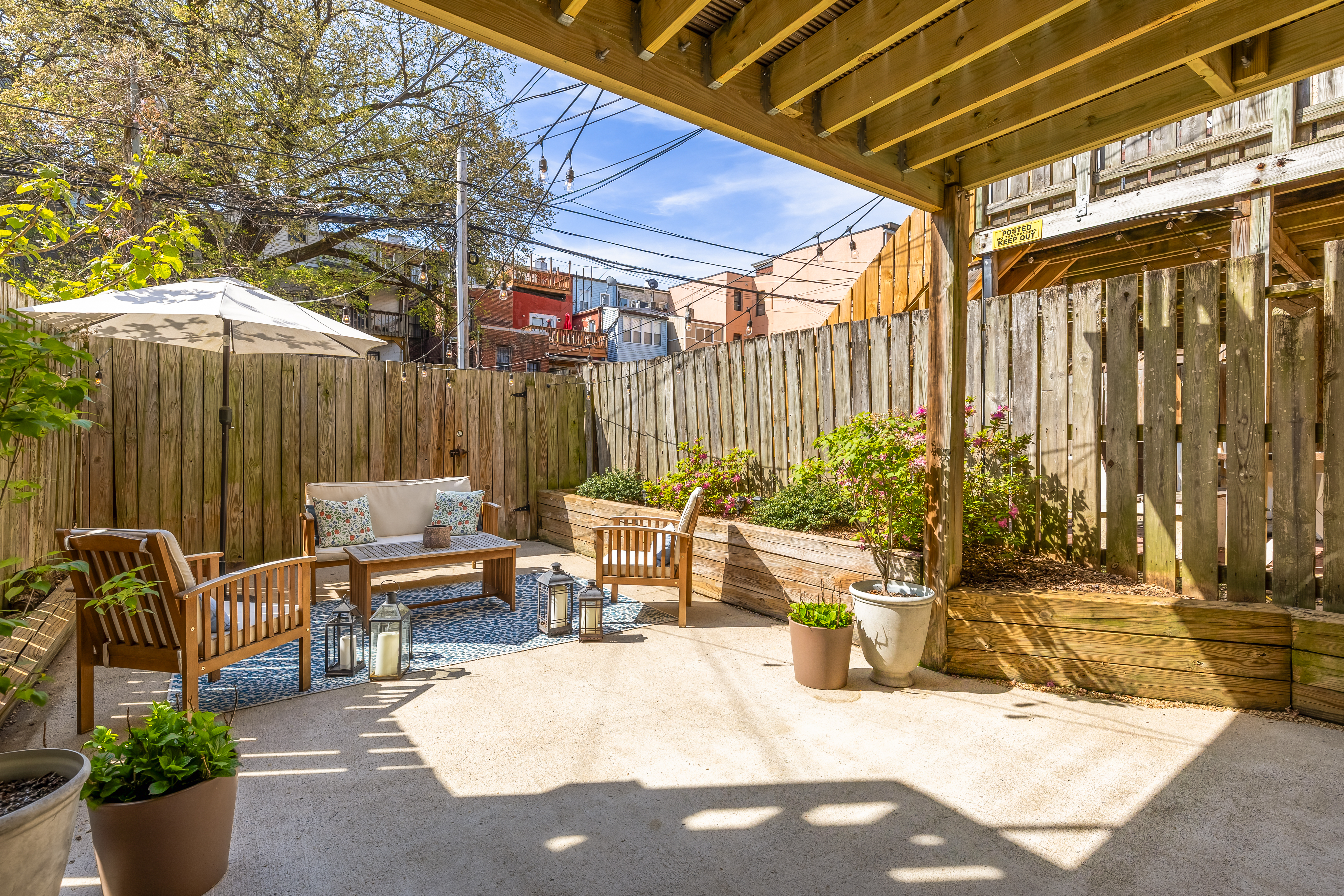 1354 Kenyon Street Northwest, Unit G Washington, DC 20010 - Photo 32 of 35 a view of a chairs and table in the patio