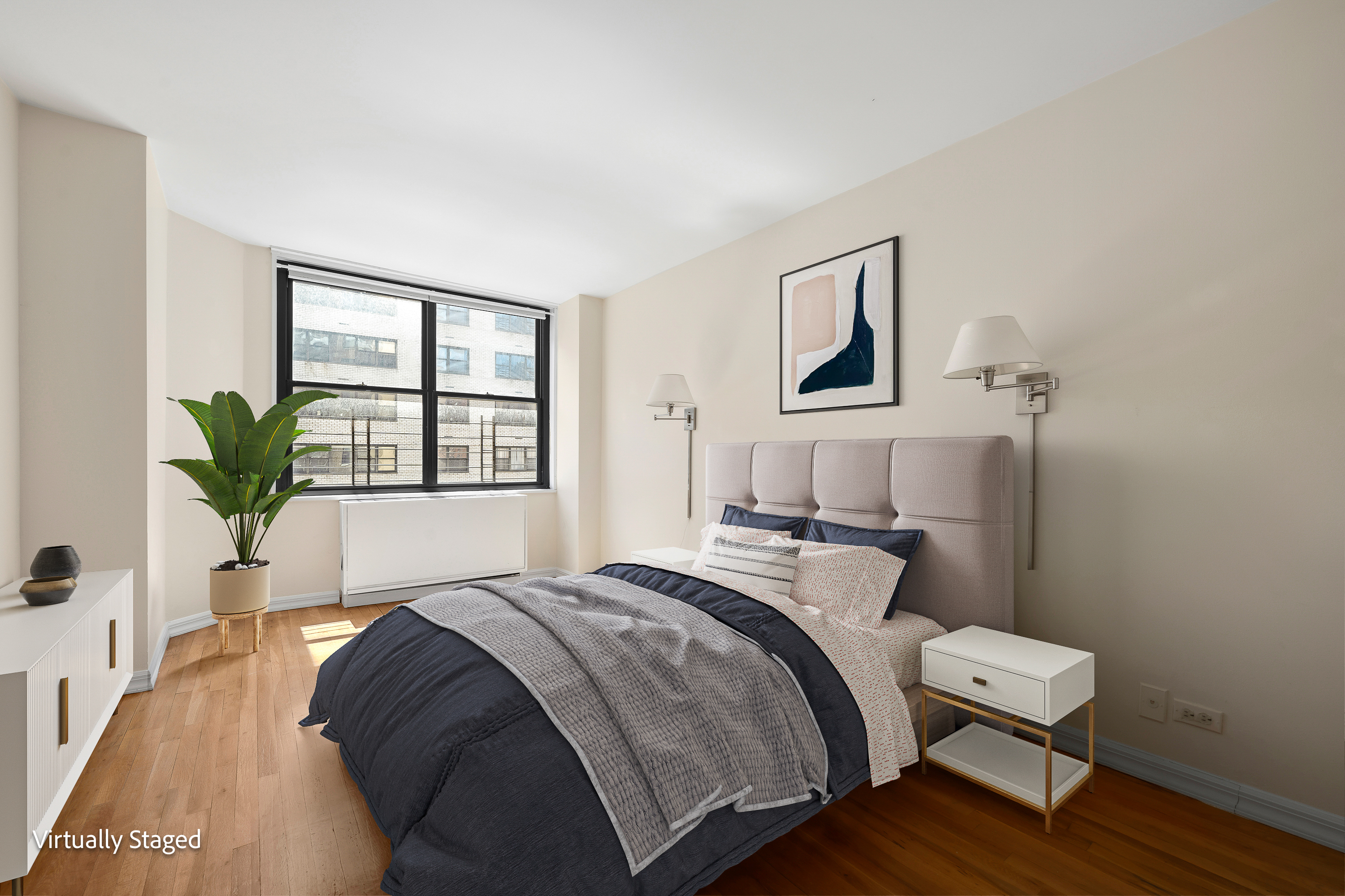 301 East 87th Street, Unit 16E Manhattan, NY 10128 - Photo 7 of 16 a bedroom with a bed and a window