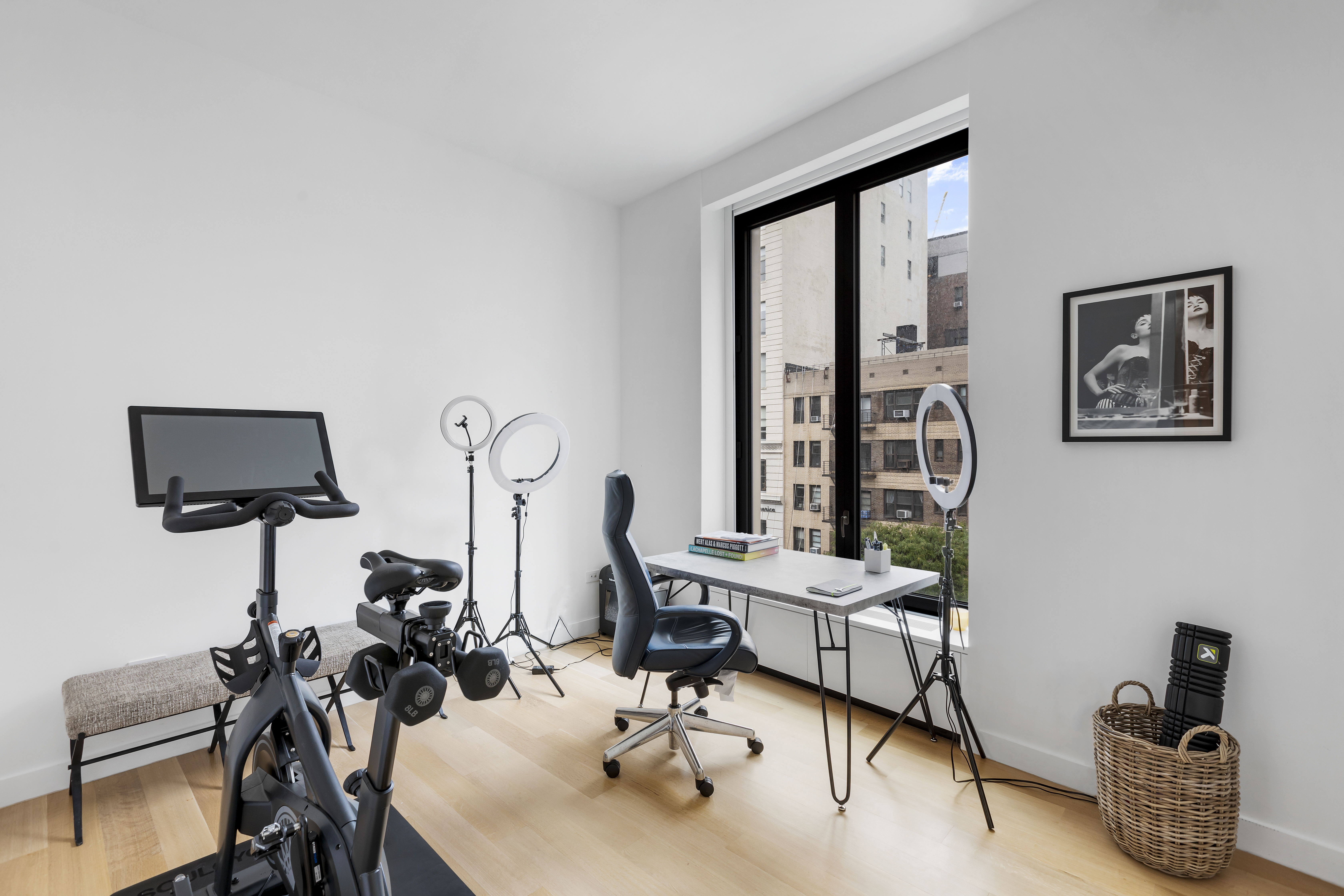 21 East 12th Street, Unit 5B Manhattan, NY 10003 - Photo 9 of 11 a view of a livingroom with workspace and a couch