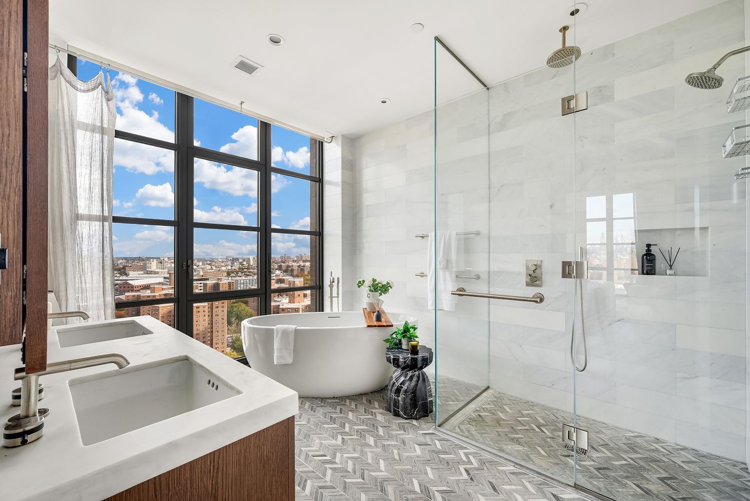 a large white kitchen with a large window