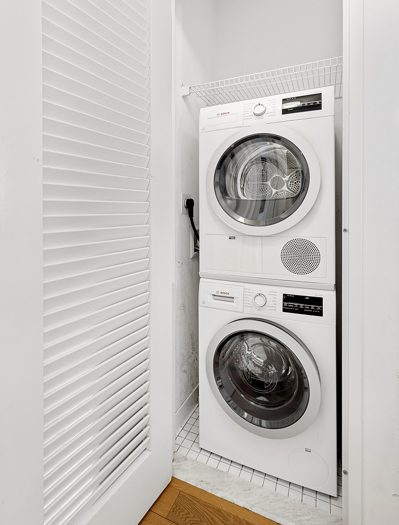 22 North 6th Street, Unit 7I Brooklyn, NY 11249 - Photo 10 of 19 a utility room with dryer and washer