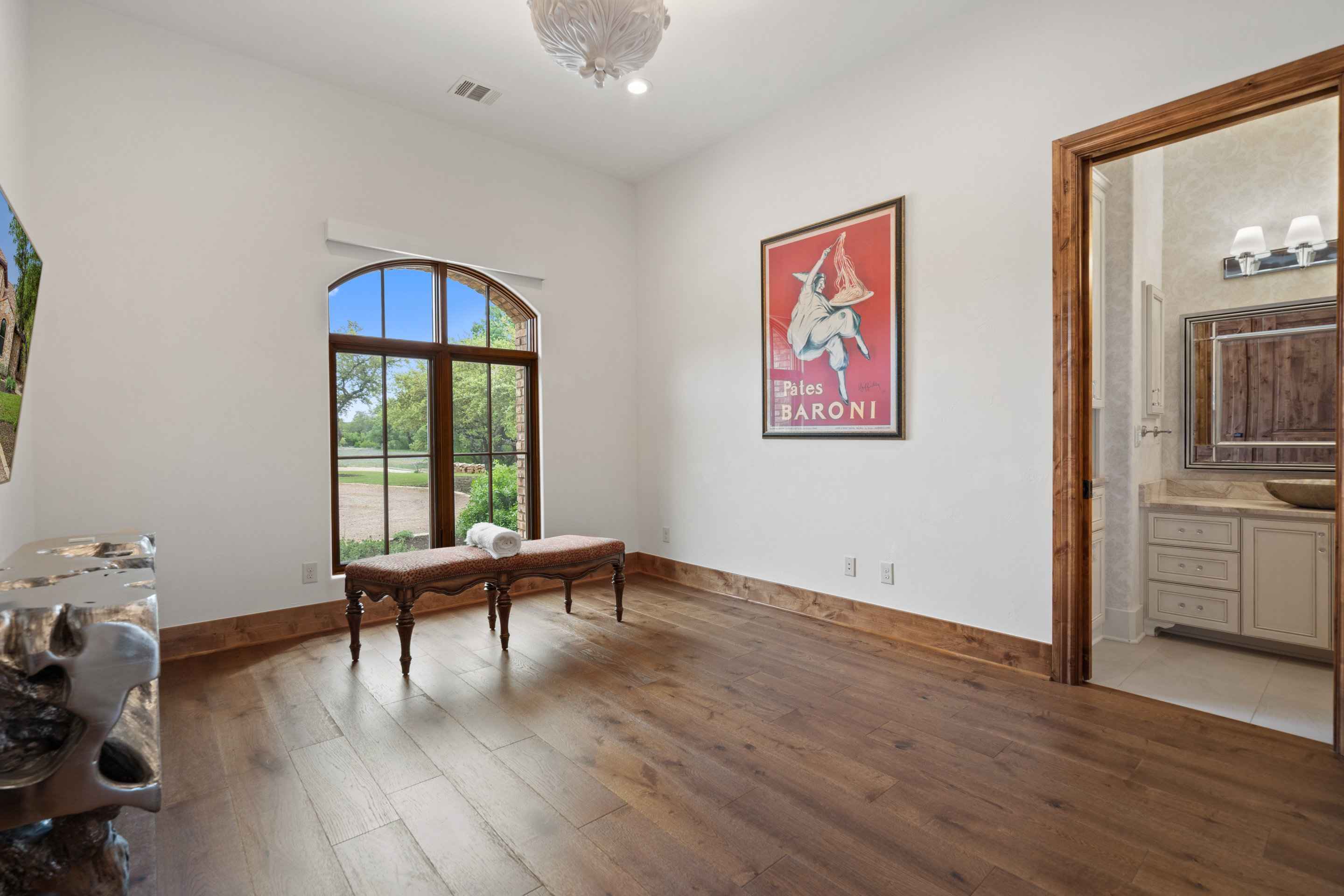 808 Rivercliff Drive Spicewood, TX 78669 - Photo 56 of 71 a workspace with wooden floor and windows