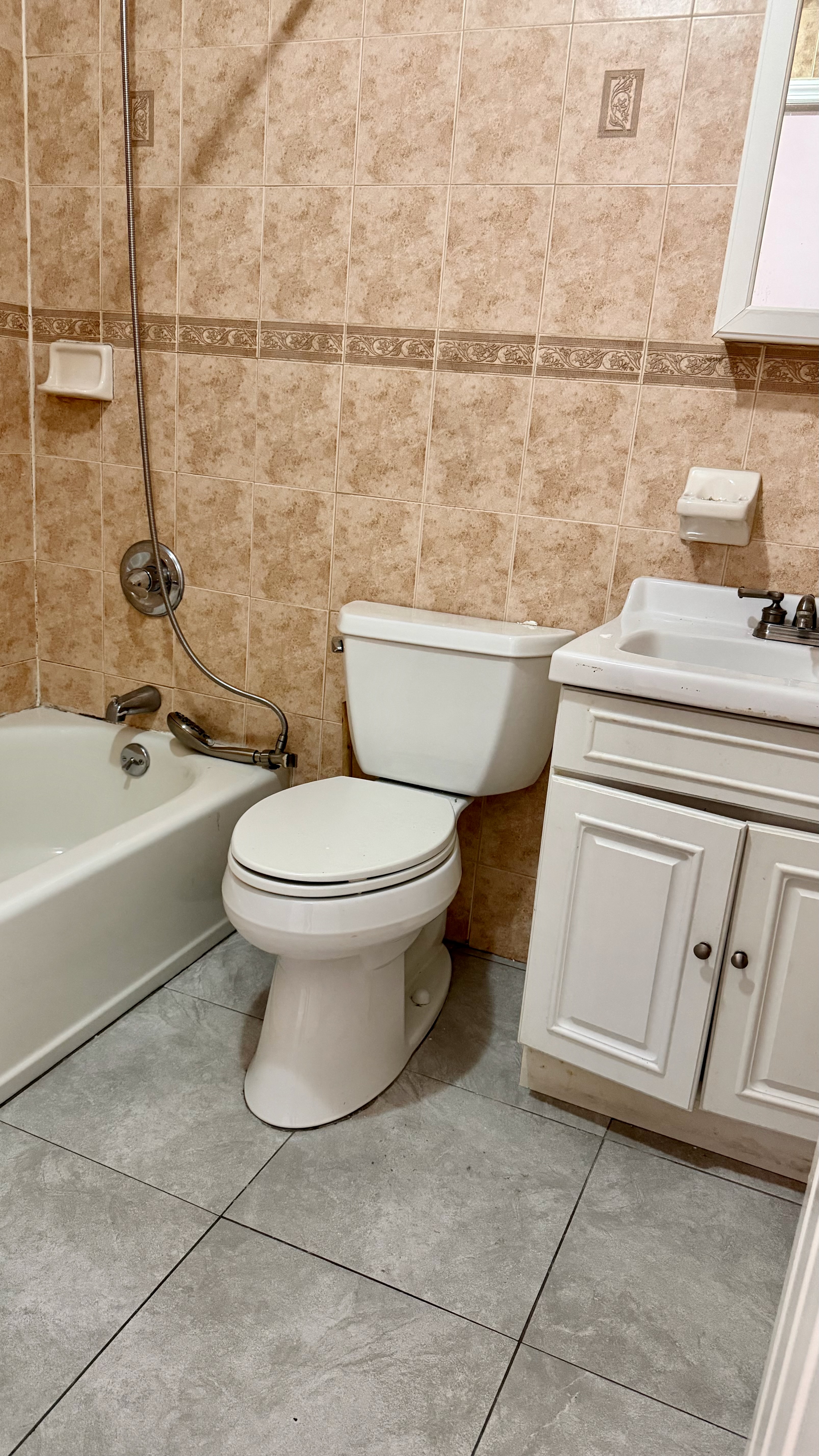 48 Schenck Avenue, Unit 3 Brooklyn, NY 11207 - Photo 7 of 7 a bathroom with a toilet and a shower