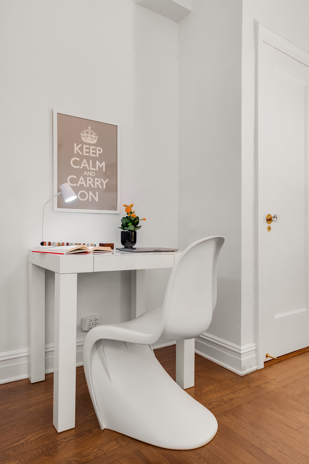 16 East 98th Street, Unit 8D Manhattan, NY 10029 - Photo 4 of 11 a room with a table and a potted plant