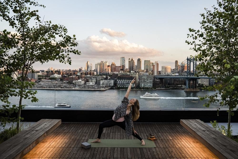 275 South Street, Unit 7PP Manhattan, NY 10002 - Photo 12 of 19 a view of a lake with tall buildings