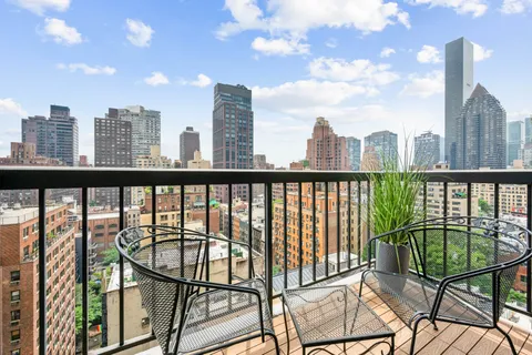 a view of a city from a balcony