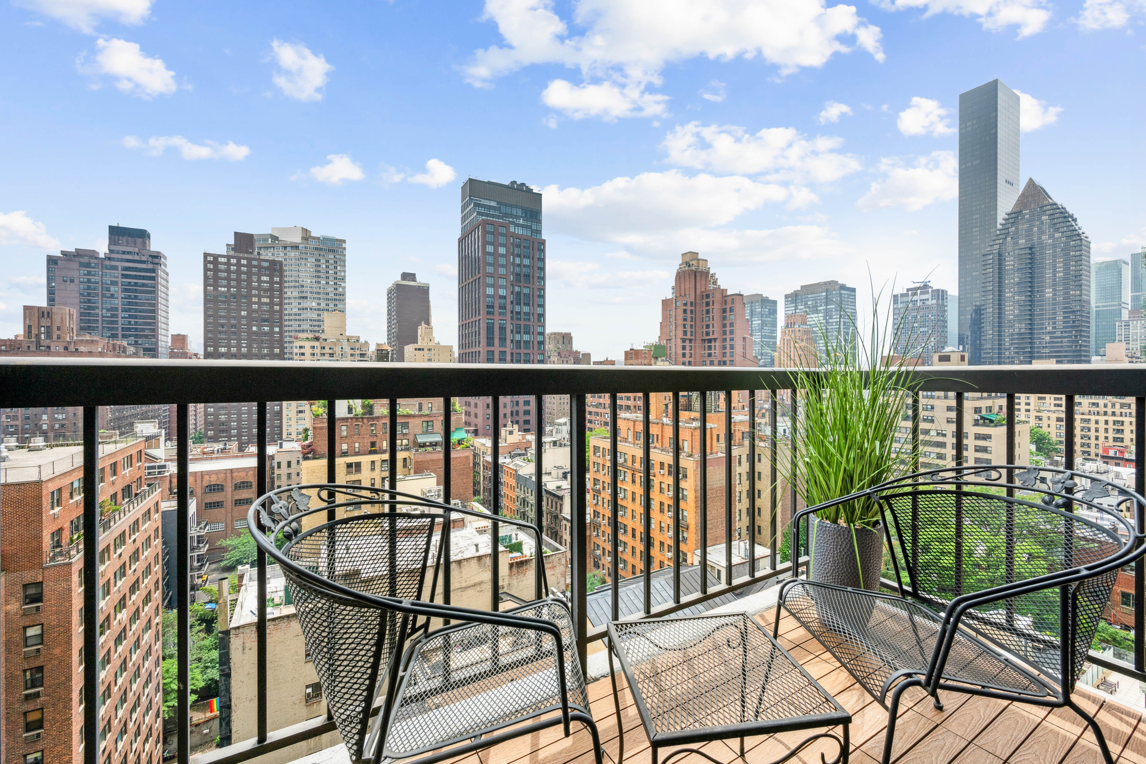 300 East 54th Street, Unit 15C Manhattan, NY 10022 - Photo 4 of 10 a view of a city from a balcony